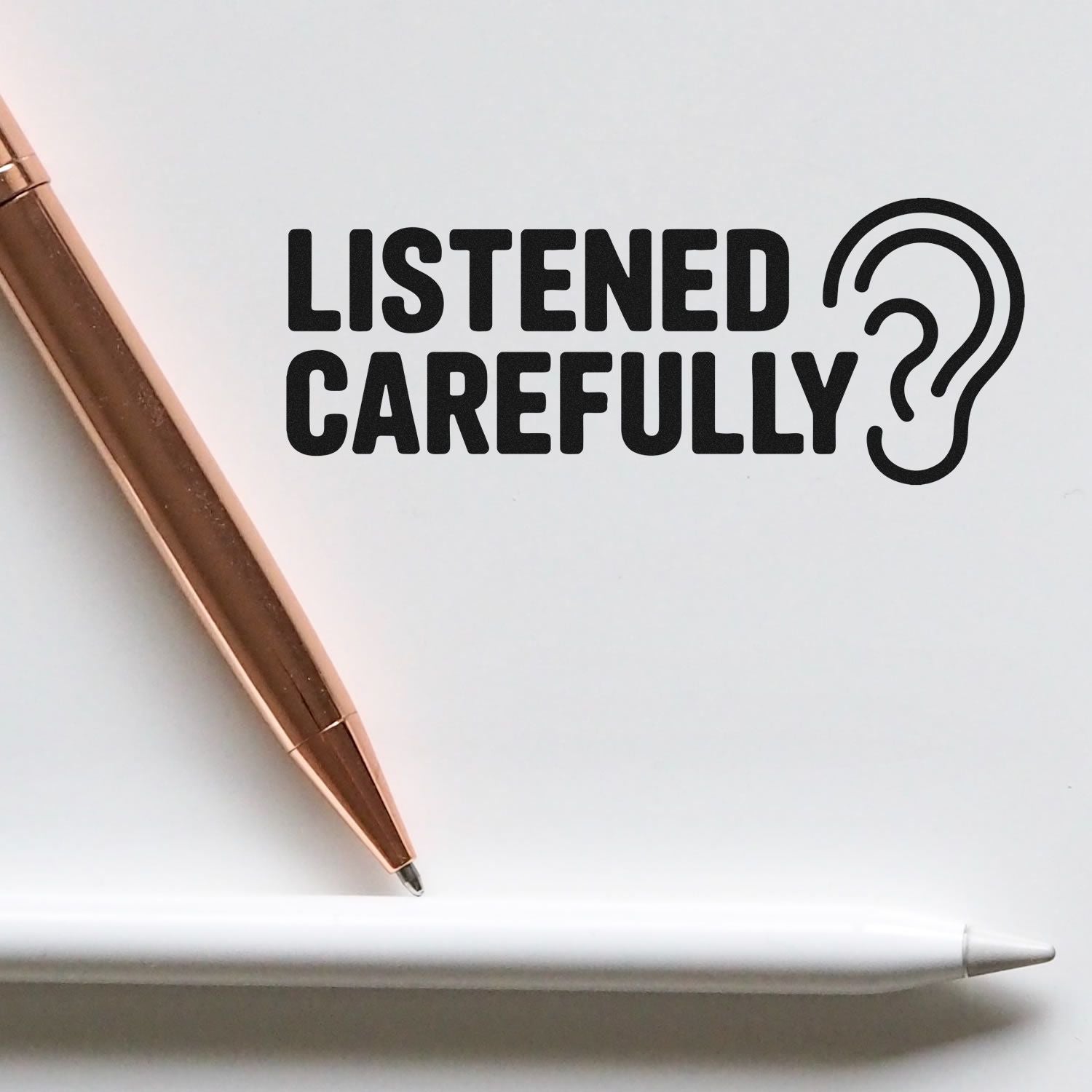 Rubber stamp design reading LISTENED CAREFULLY with ear icon for office, teacher, or customer service feedback.