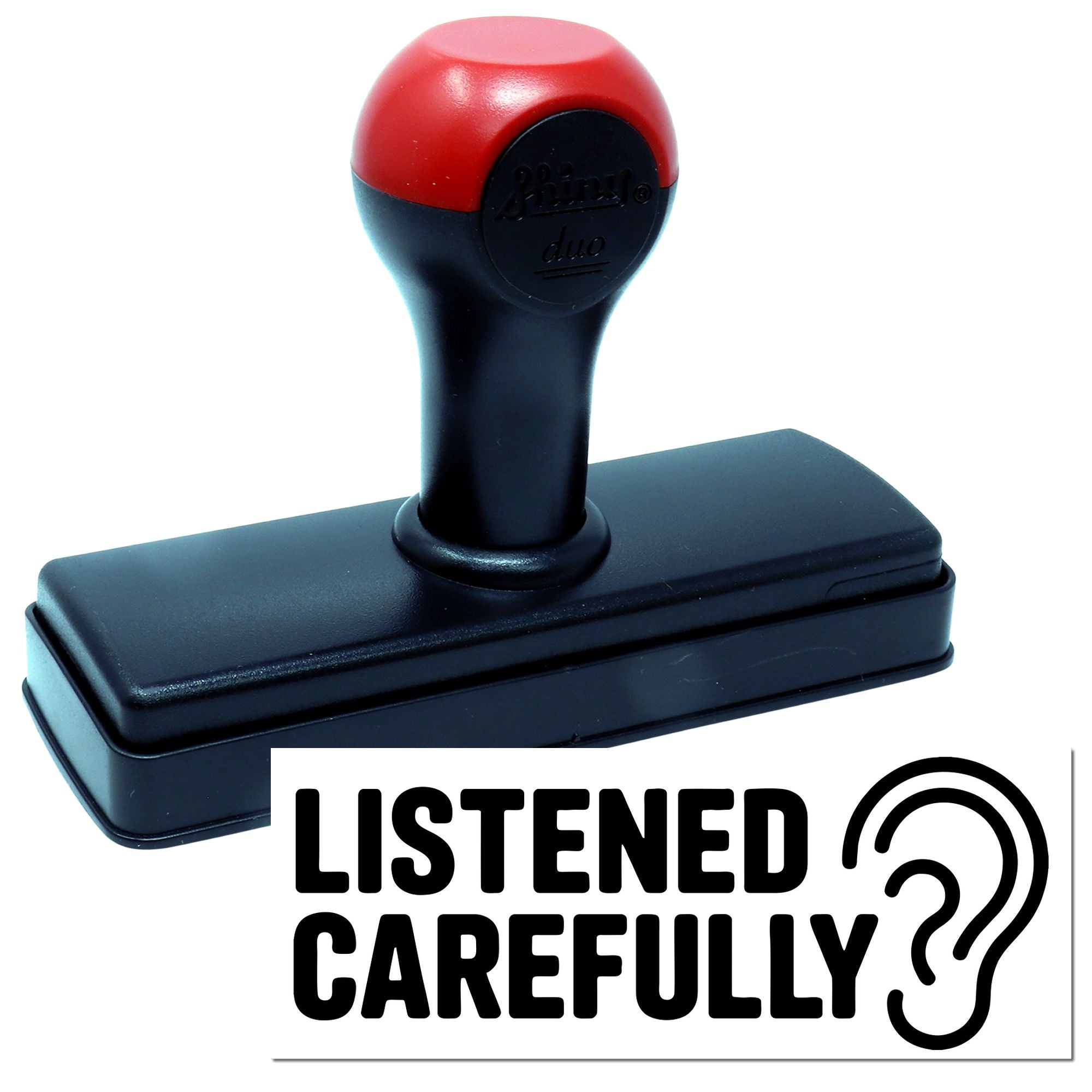 Self-inking rubber stamp with bold LISTENED CAREFULLY imprint and ear icon, ideal for office feedback forms.
