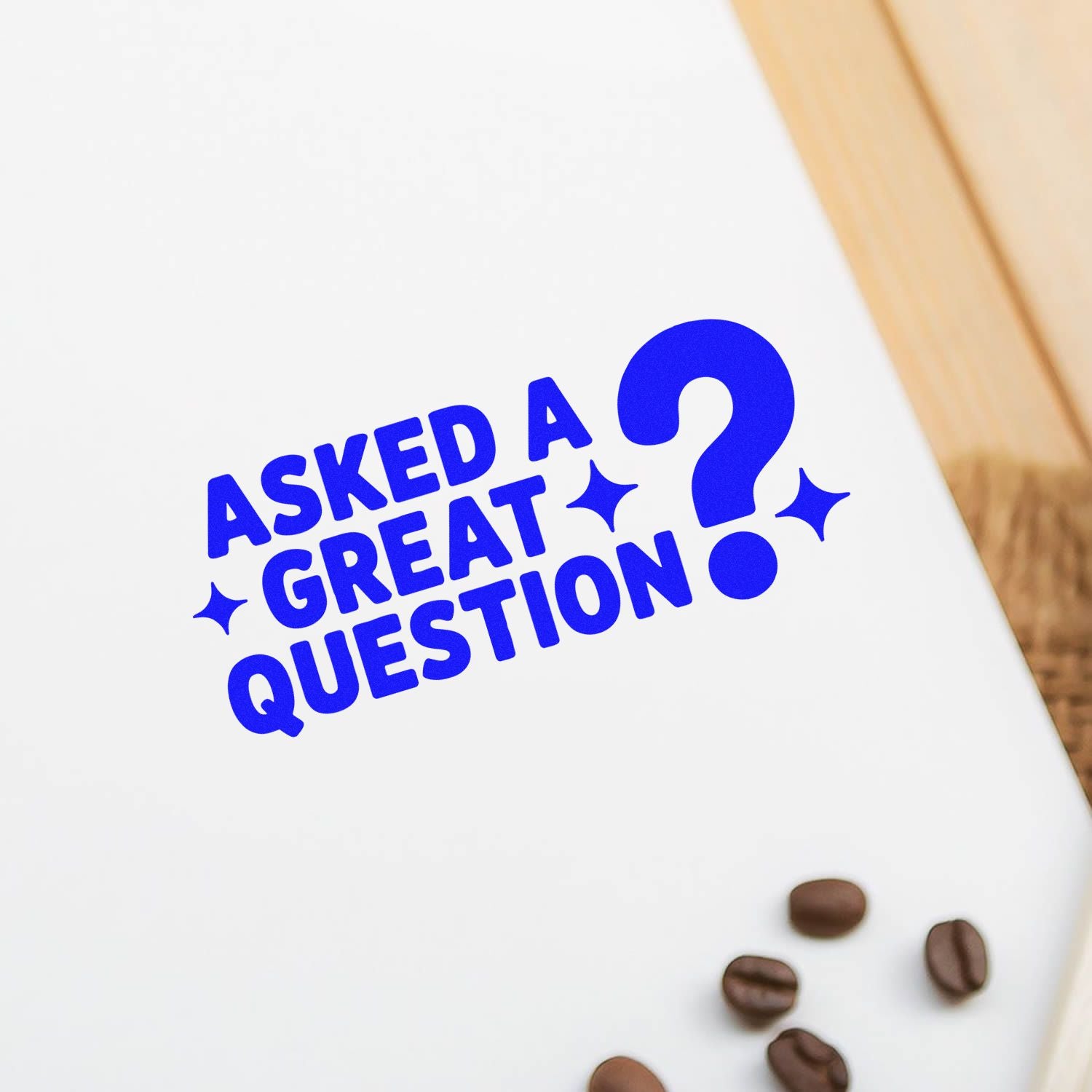 Blue Asked a Great Question rubber stamp design on white paper with question mark and sparkles.