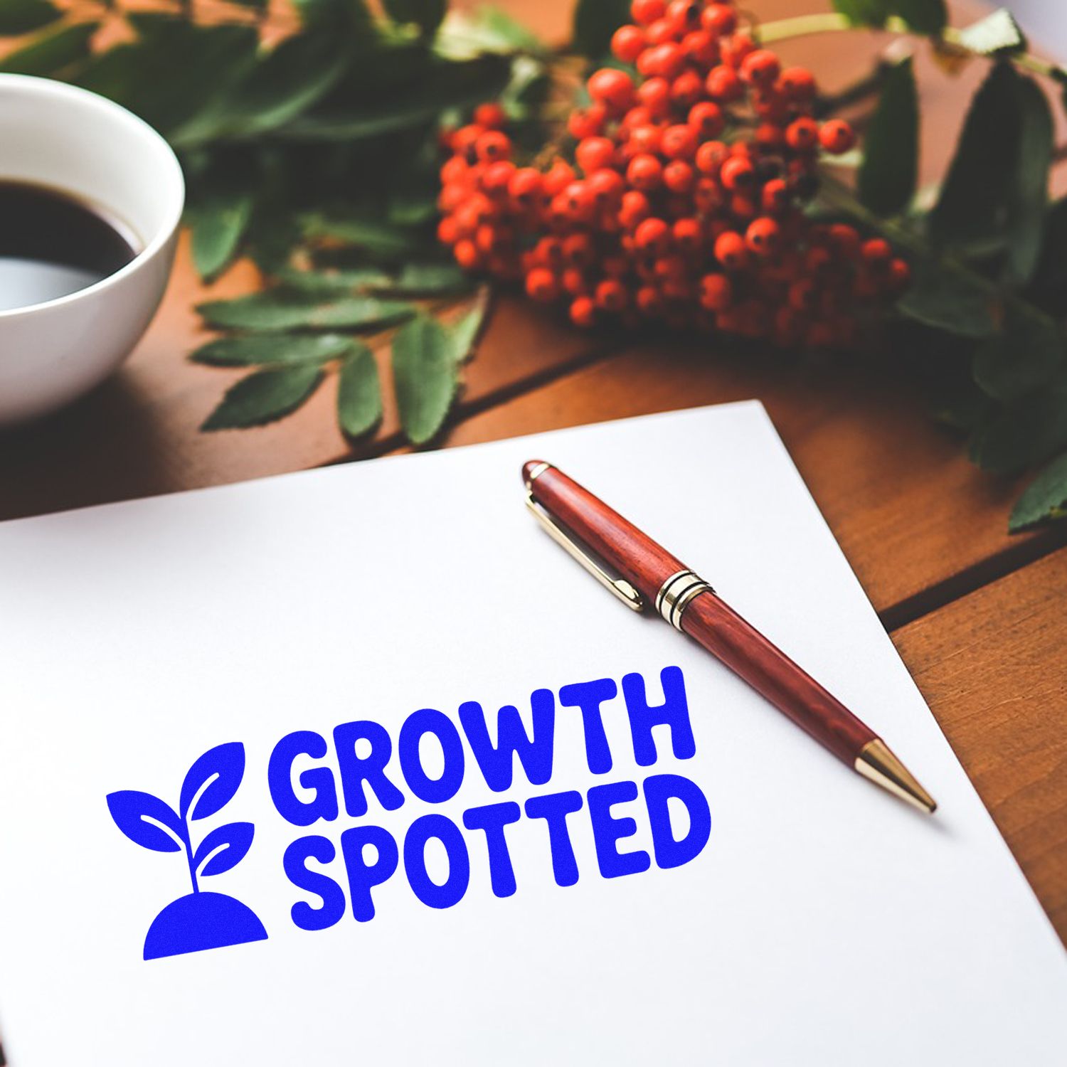 Custom rubber stamp design reading Growth Spotted with plant icon on paper, ideal for eco branding and stationery.