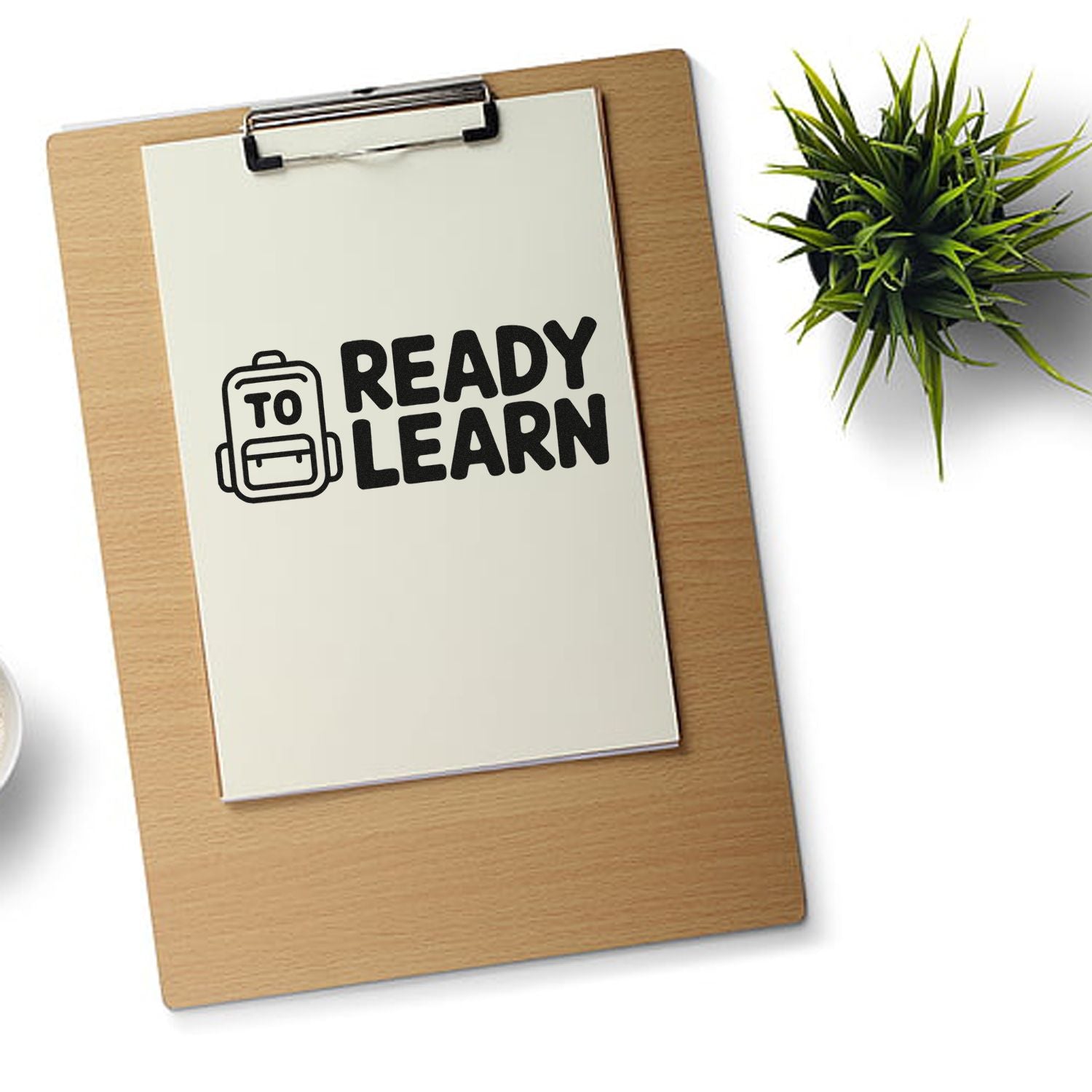 Ready to Learn classroom rubber stamp design on clipboard, ideal for teacher supplies and back-to-school organization.