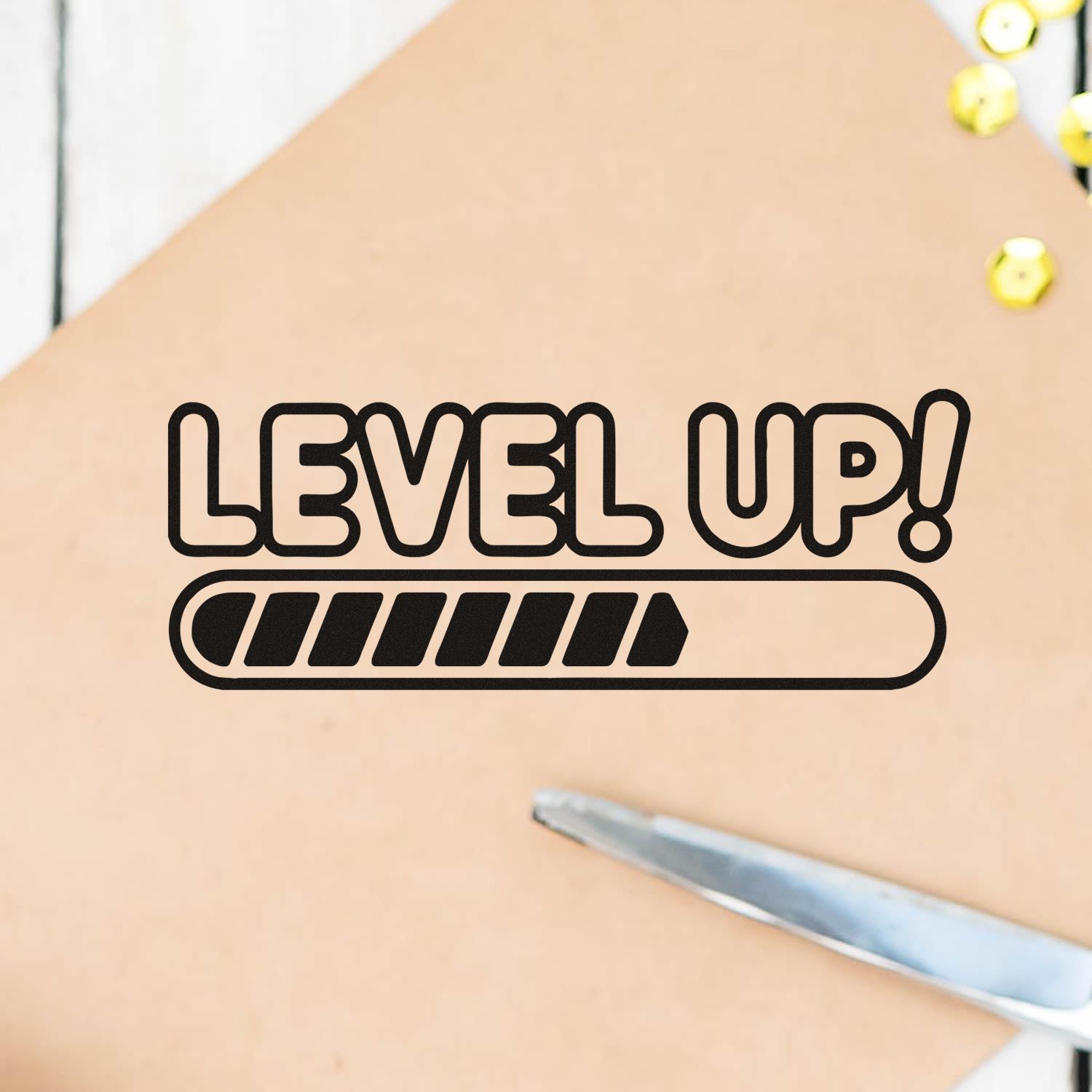 Level Up rubber stamp design with progress bar, ideal for motivational crafts, planners, and packaging.