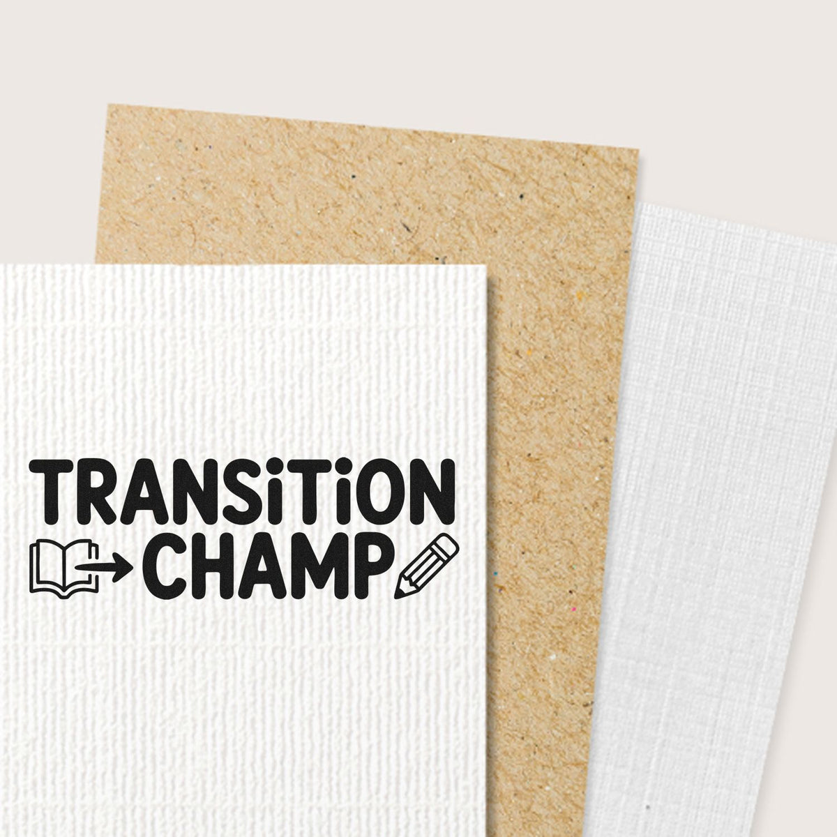 Transition Champ rubber stamp mockup on textured paper, featuring book, arrow, and pencil icons for student achievement.