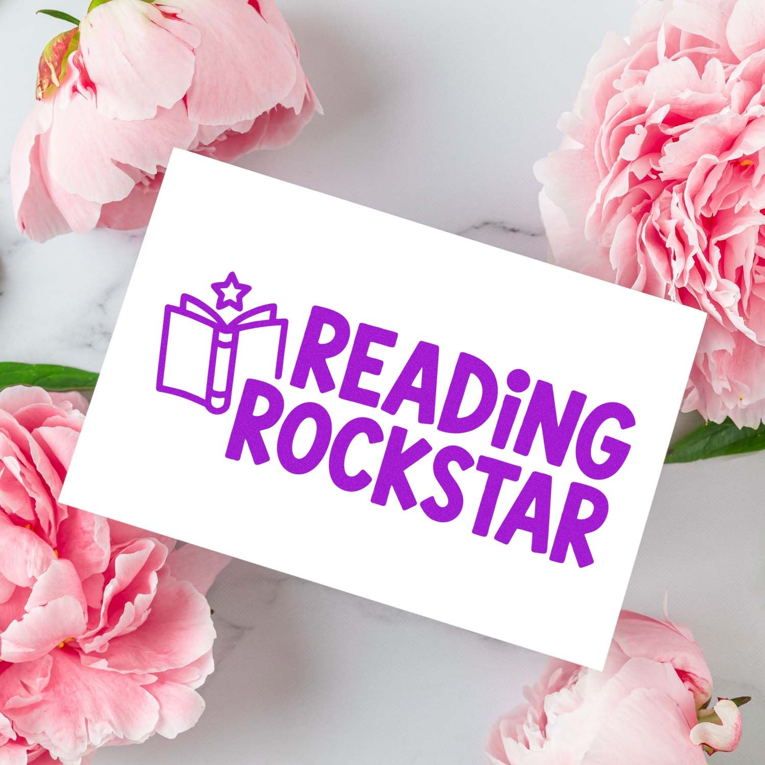 Reading Rockstar rubber stamp design with book icon, ideal for classroom rewards, library crafts, and teacher stamping.