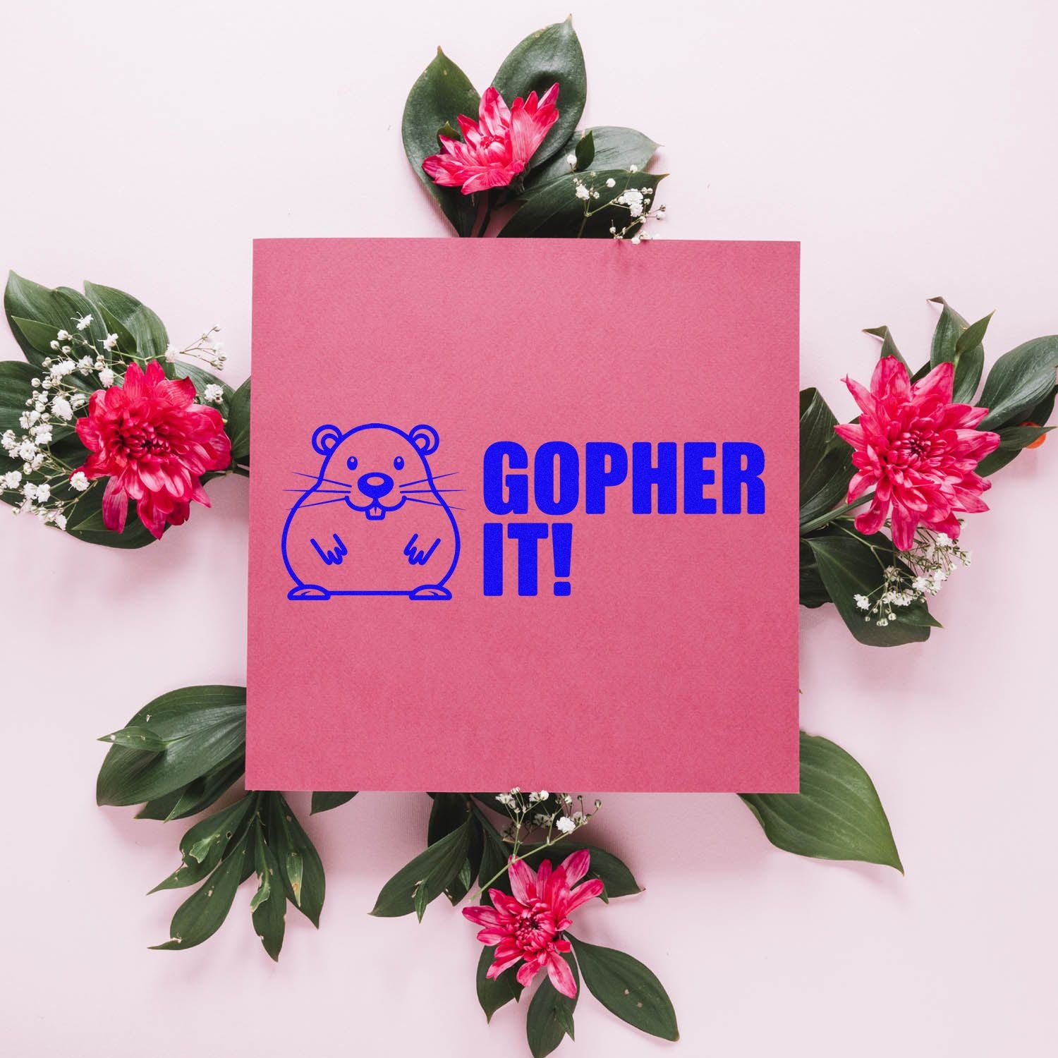 Custom rubber stamp featuring gopher illustration and Gopher It! slogan on pink card with floral styling.