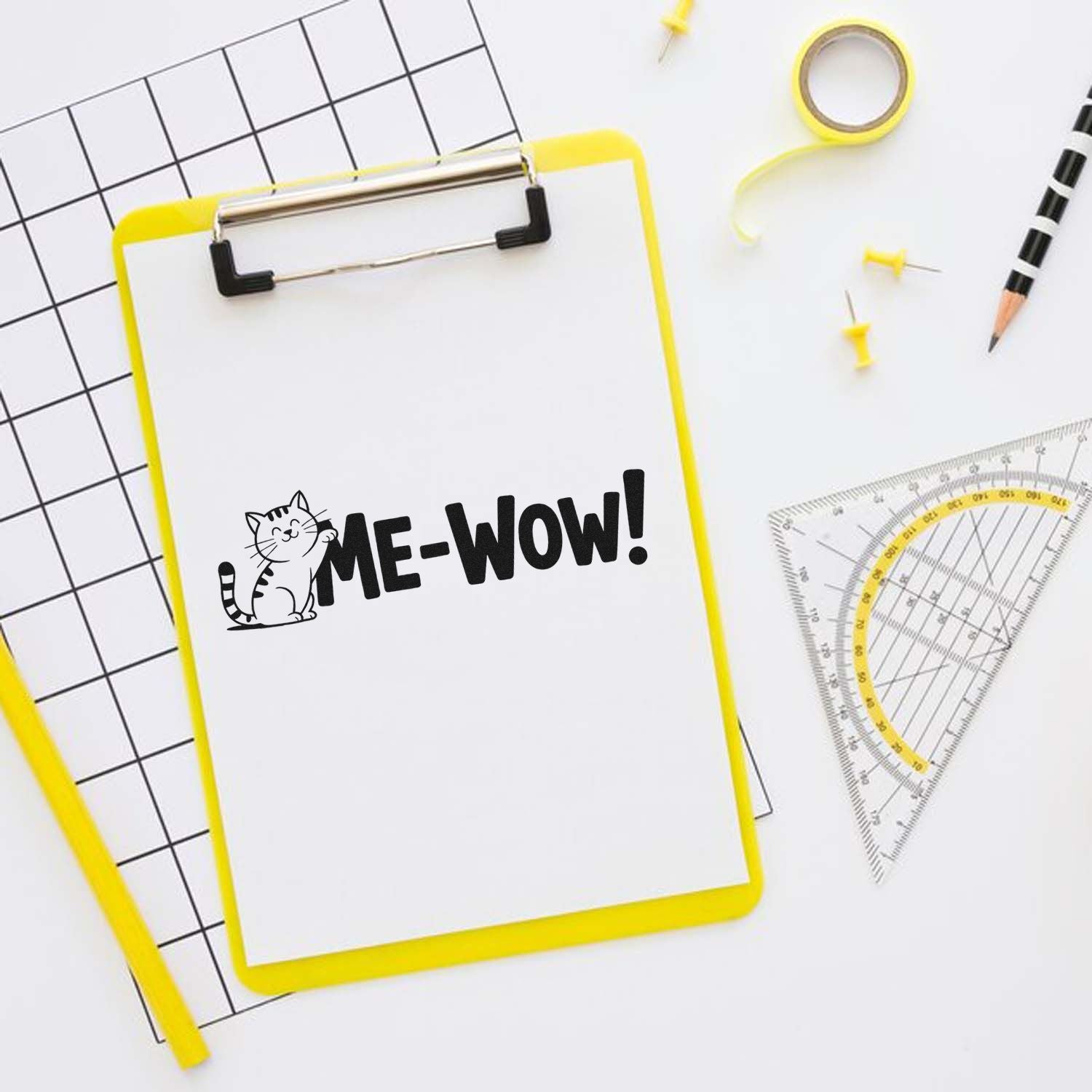 Cat ME-WOW! rubber stamp on clipboard, a playful custom stamp design for stationery, teachers, and office use.