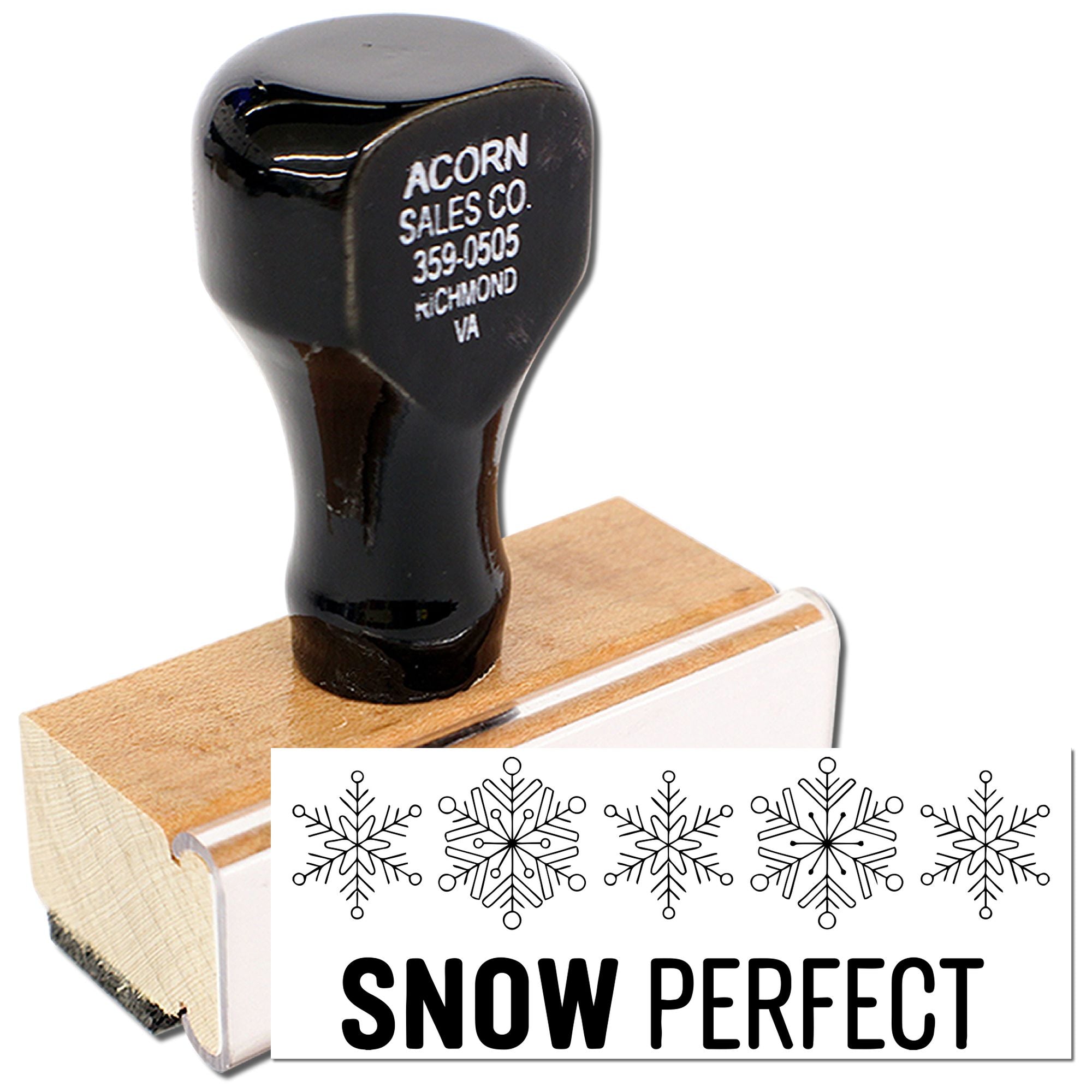 Custom rubber stamp with snowflake design and SNOW PERFECT impression for holiday packaging and craft branding.