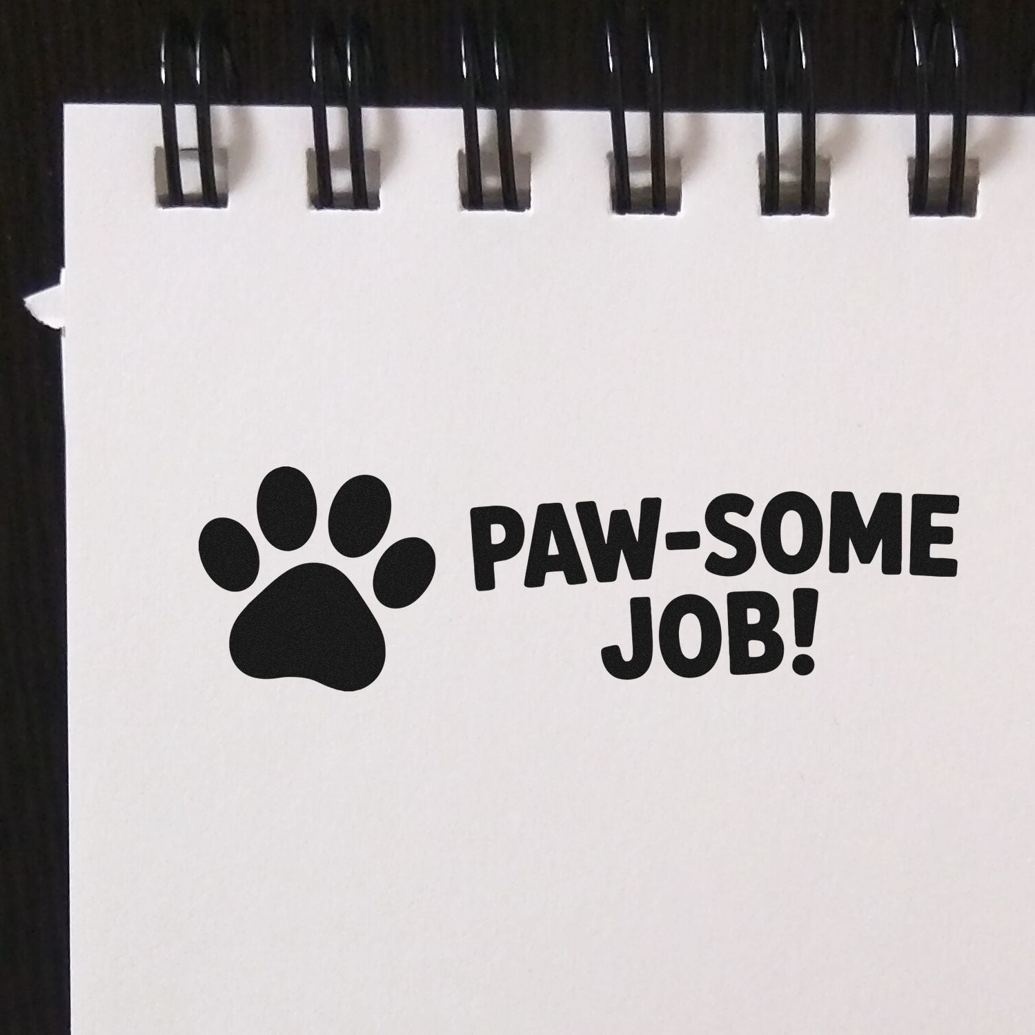 Paw-some job rubber stamp with paw print, perfect for pet-themed classroom rewards and teacher feedback.
