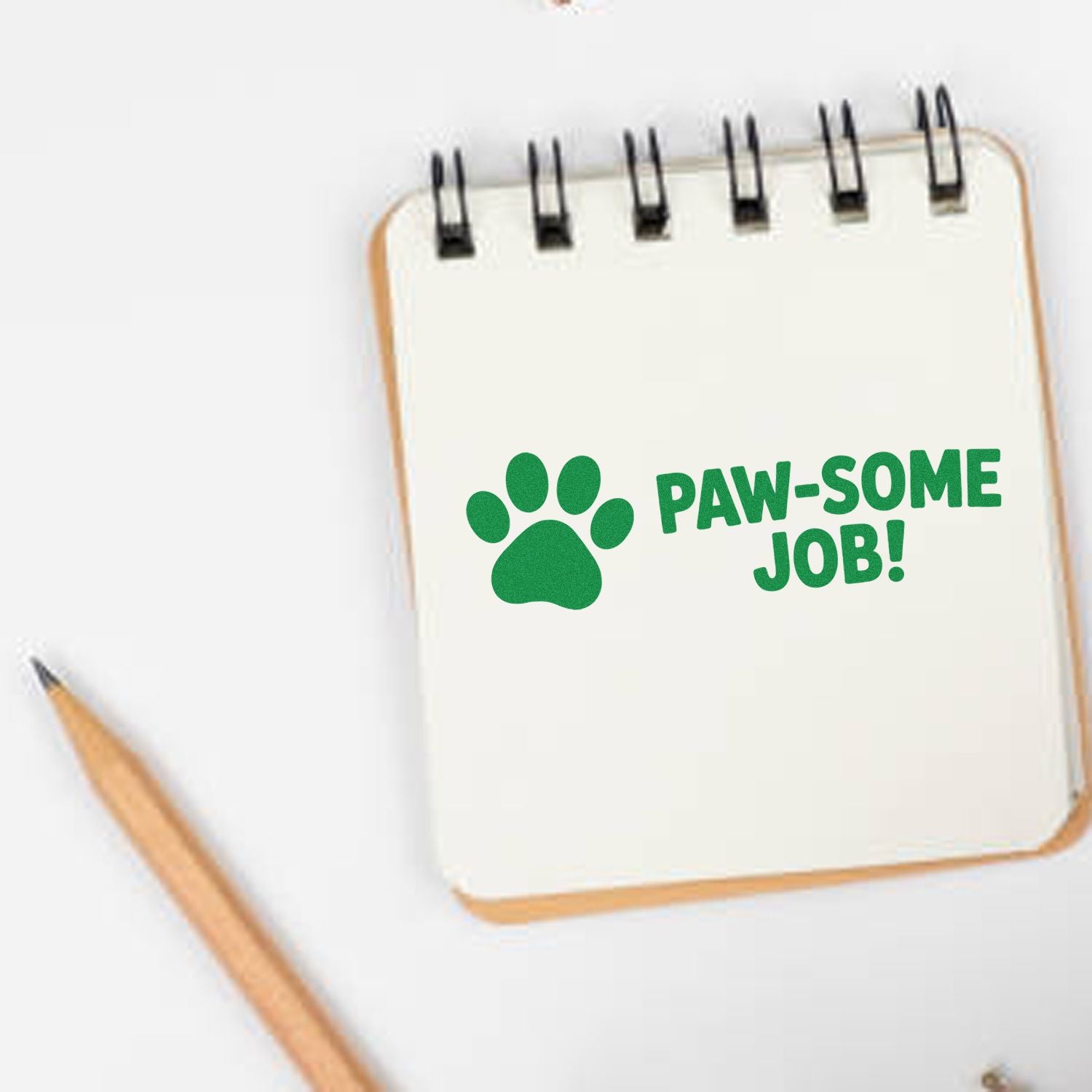 Paw print rubber stamp saying Paw-some Job! for pet-themed crafts, teacher rewards, and custom stationery.