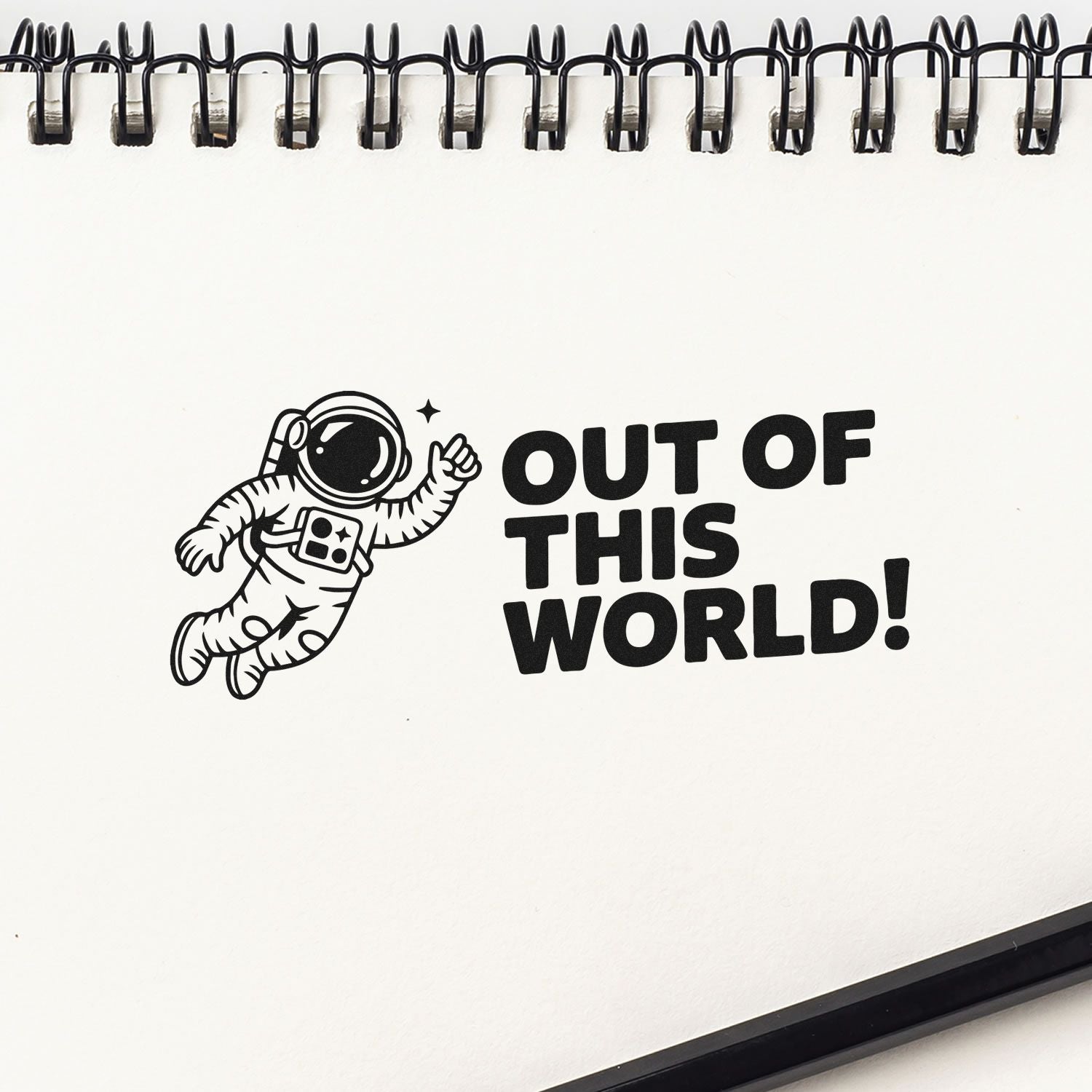 Astronaut rubber stamp with Out of This World! text, perfect for space-themed cards, scrapbooking, and craft projects.