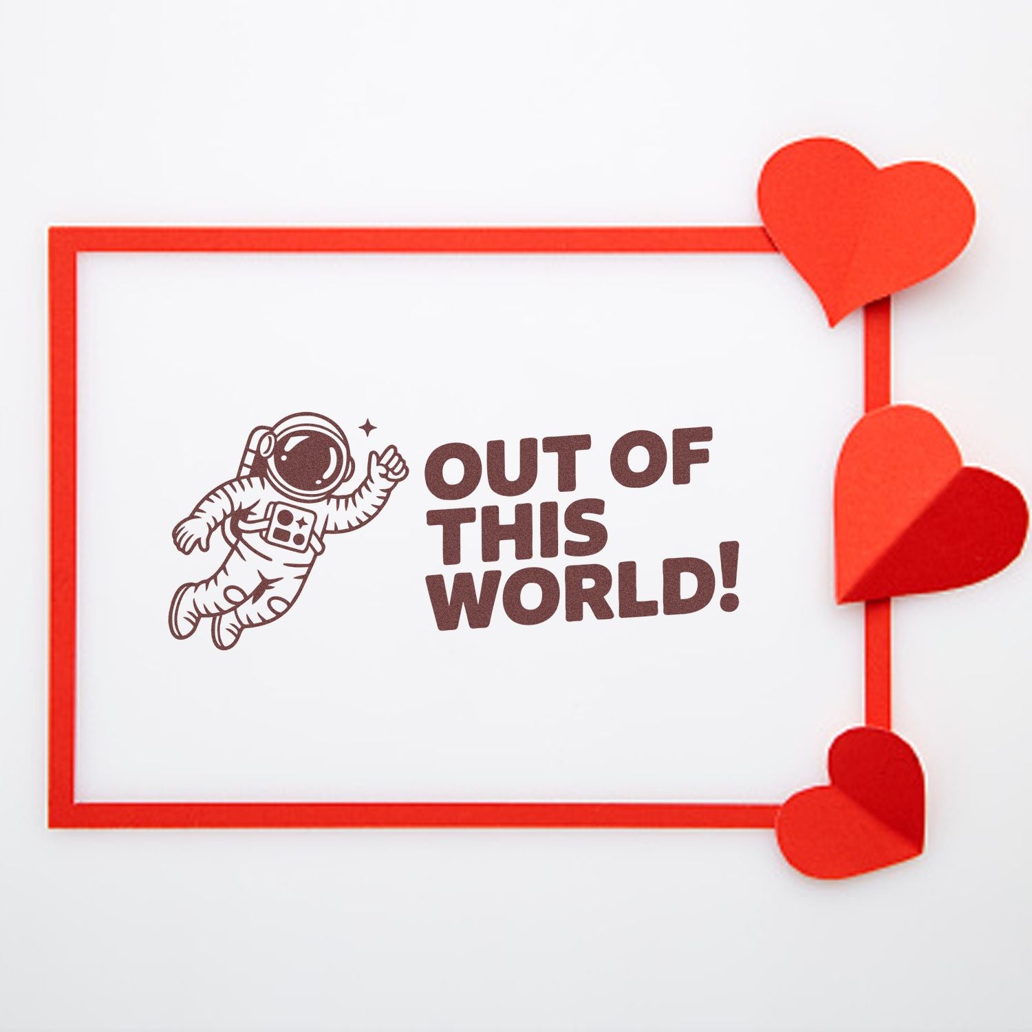 Astronaut rubber stamp design with Out of This World! text, perfect for space-themed cards, crafts, and Valentines gifts.