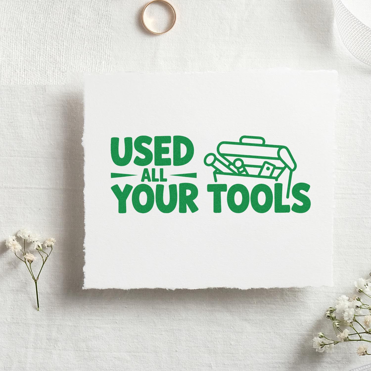 Green rubber stamp design reading Used All Your Tools with toolbox icon for DIY and handyman projects.
