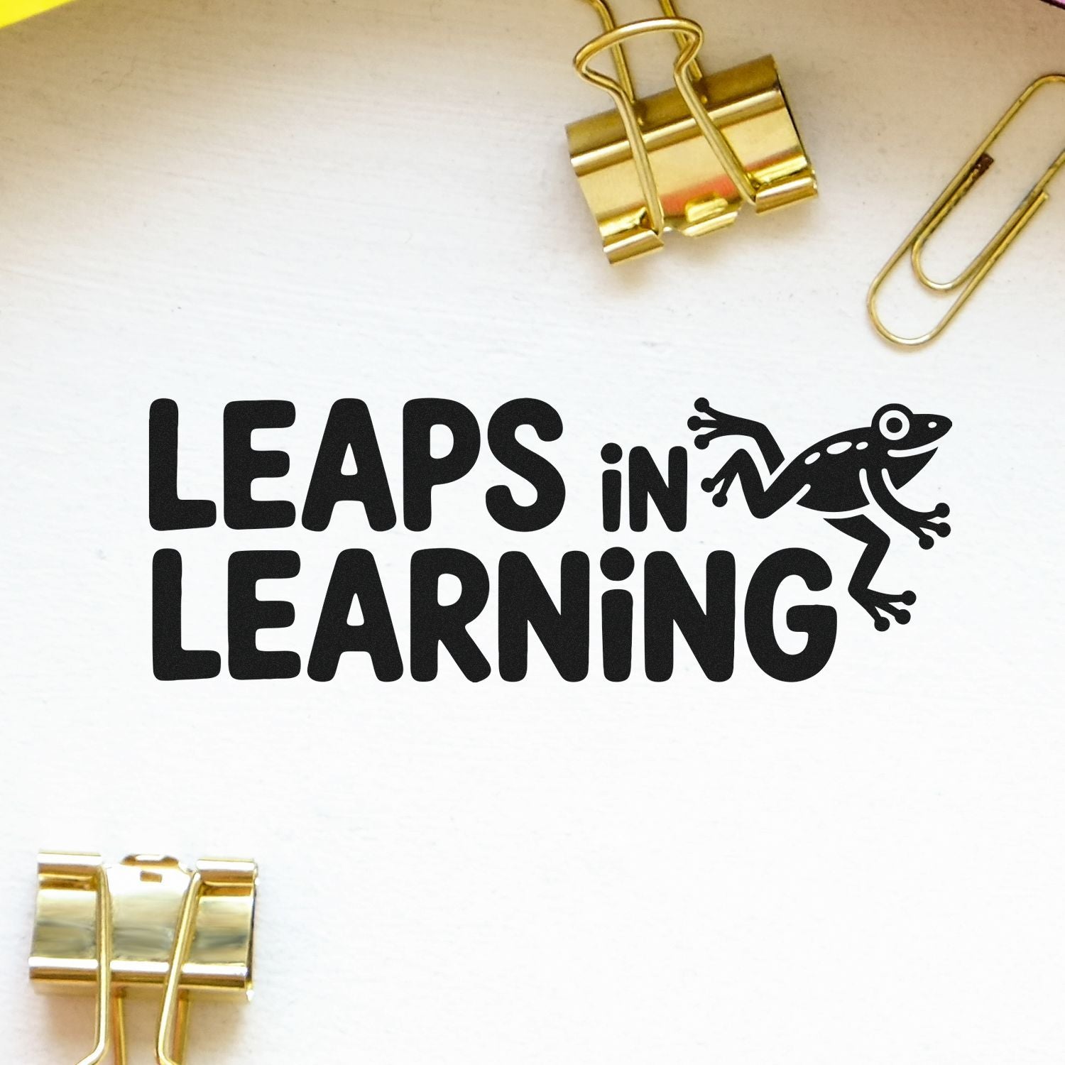 Leaps in Learning frog rubber stamp design for teachers, classrooms, and educational crafts with bold text and a jumping frog.