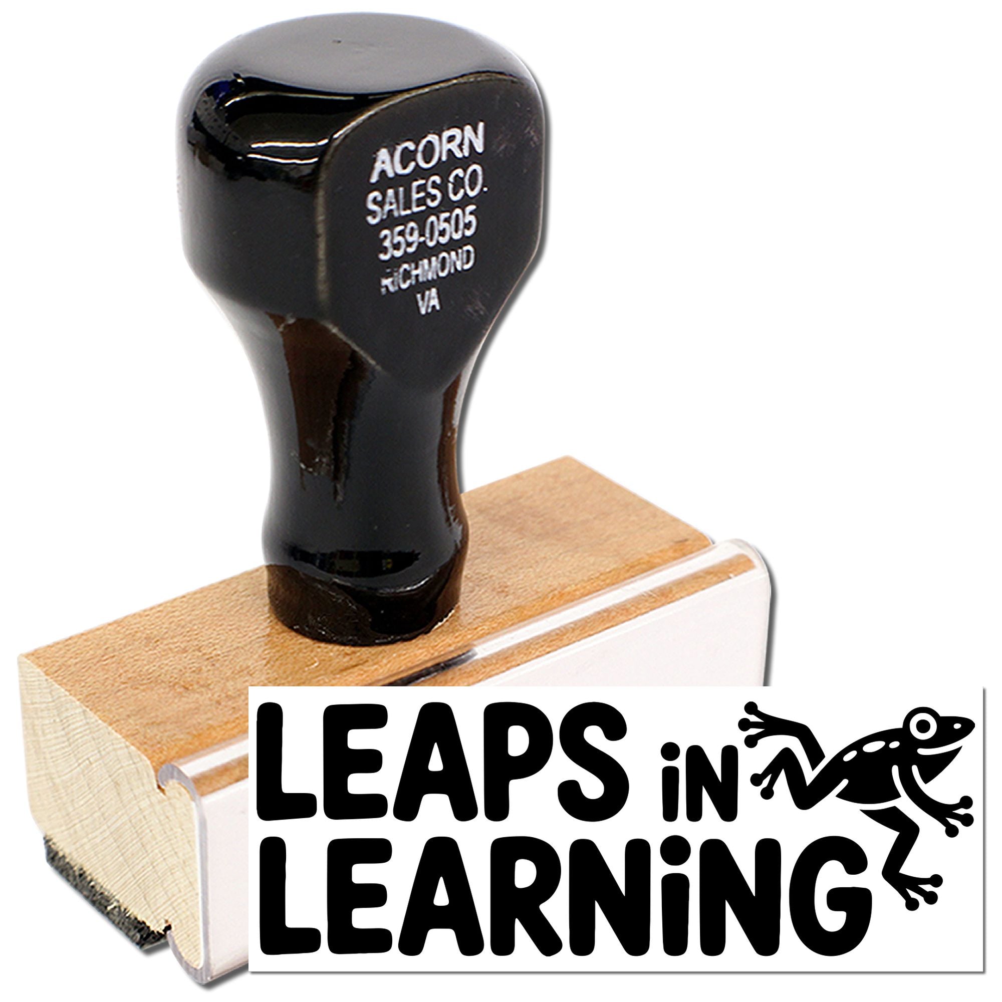 Wood handle rubber stamp for classrooms, featuring Leaps in Learning frog design.