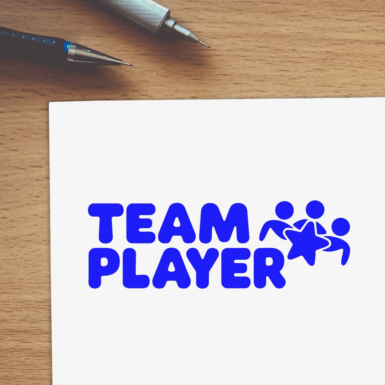 Custom team player rubber stamp design on white paper, ideal for employee recognition, teamwork, and office branding.
