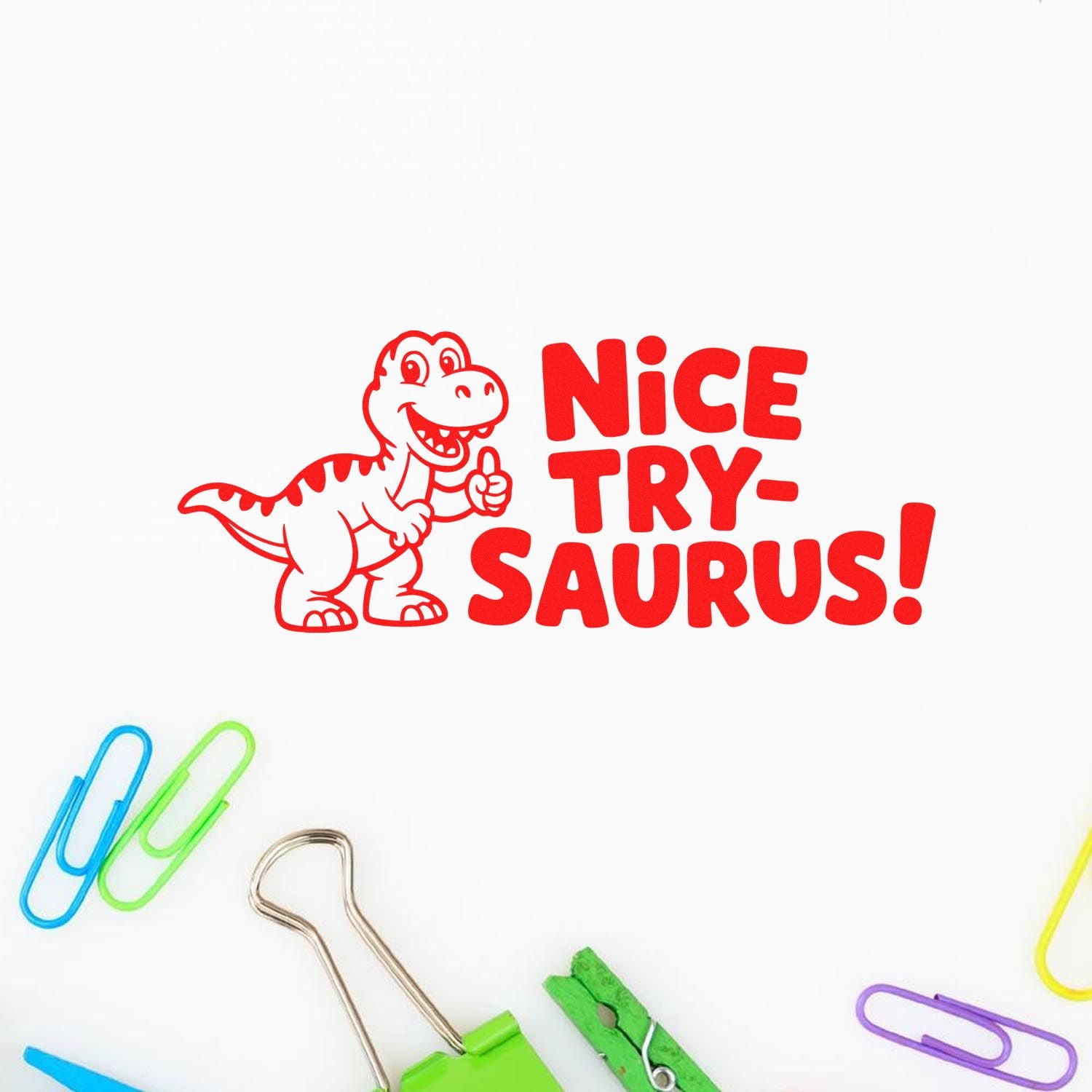 Nice Try-saurus rubber stamp with cartoon dinosaur, ideal for playful teacher feedback on student work.