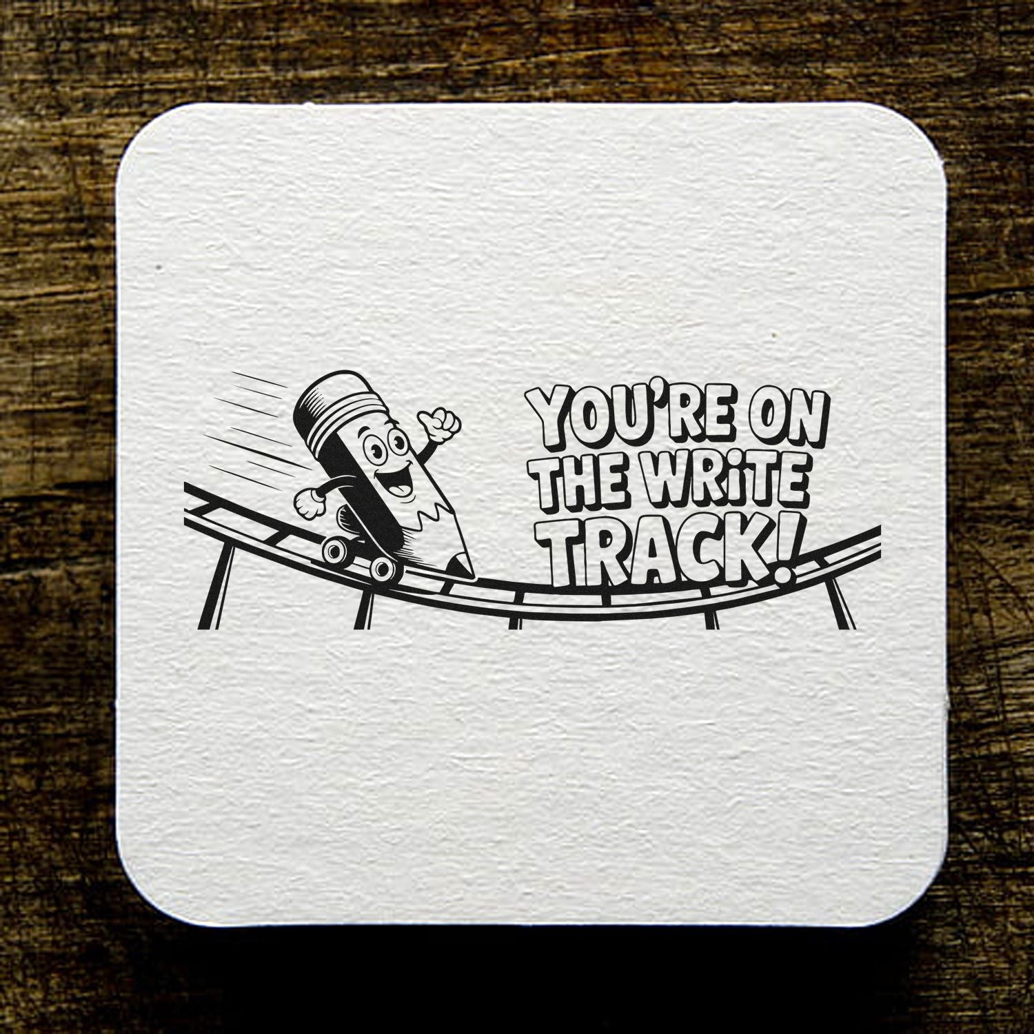 Teacher rubber stamp design with cartoon pencil skateboard and Youre on the Write Track! motivational text.