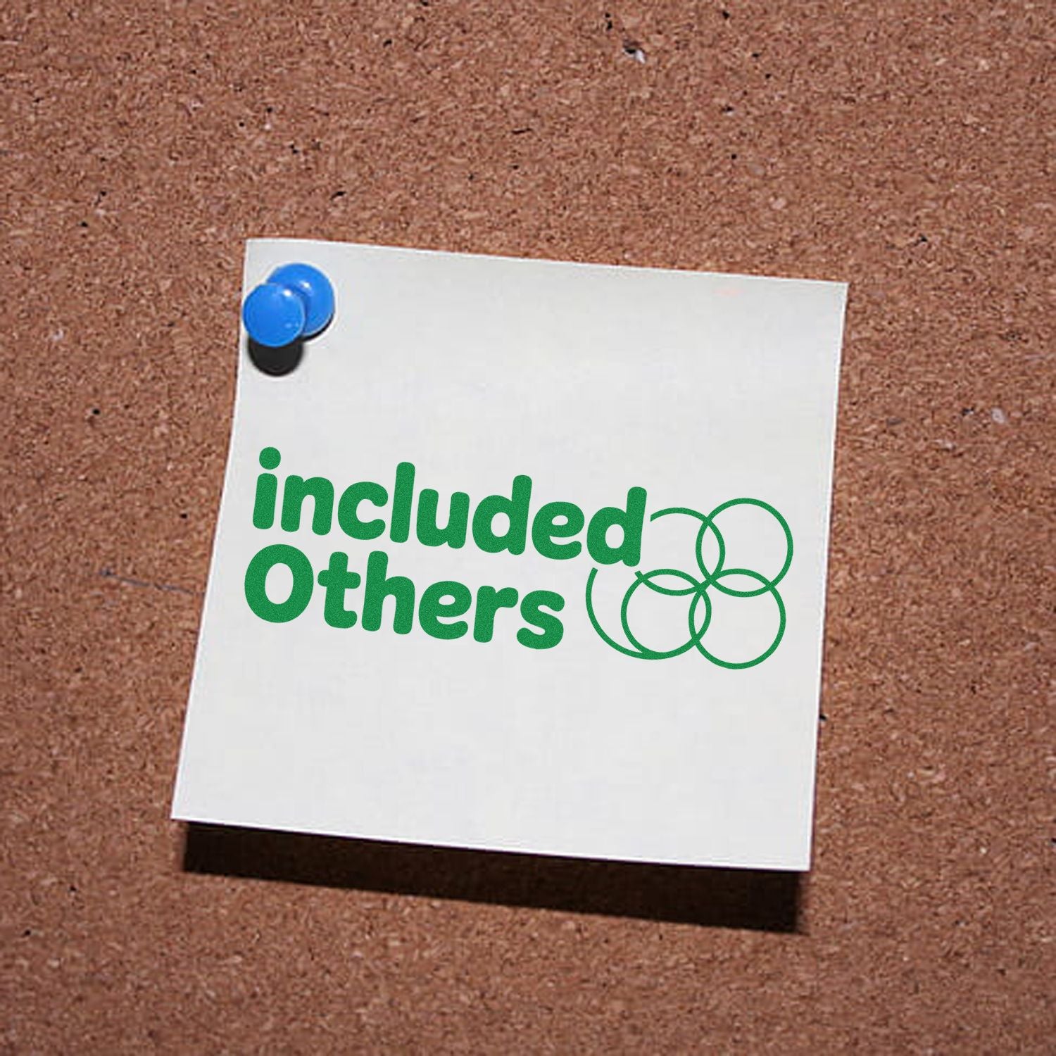 Green Included Others rubber stamp design on a pinned note for inclusive office or classroom labeling.