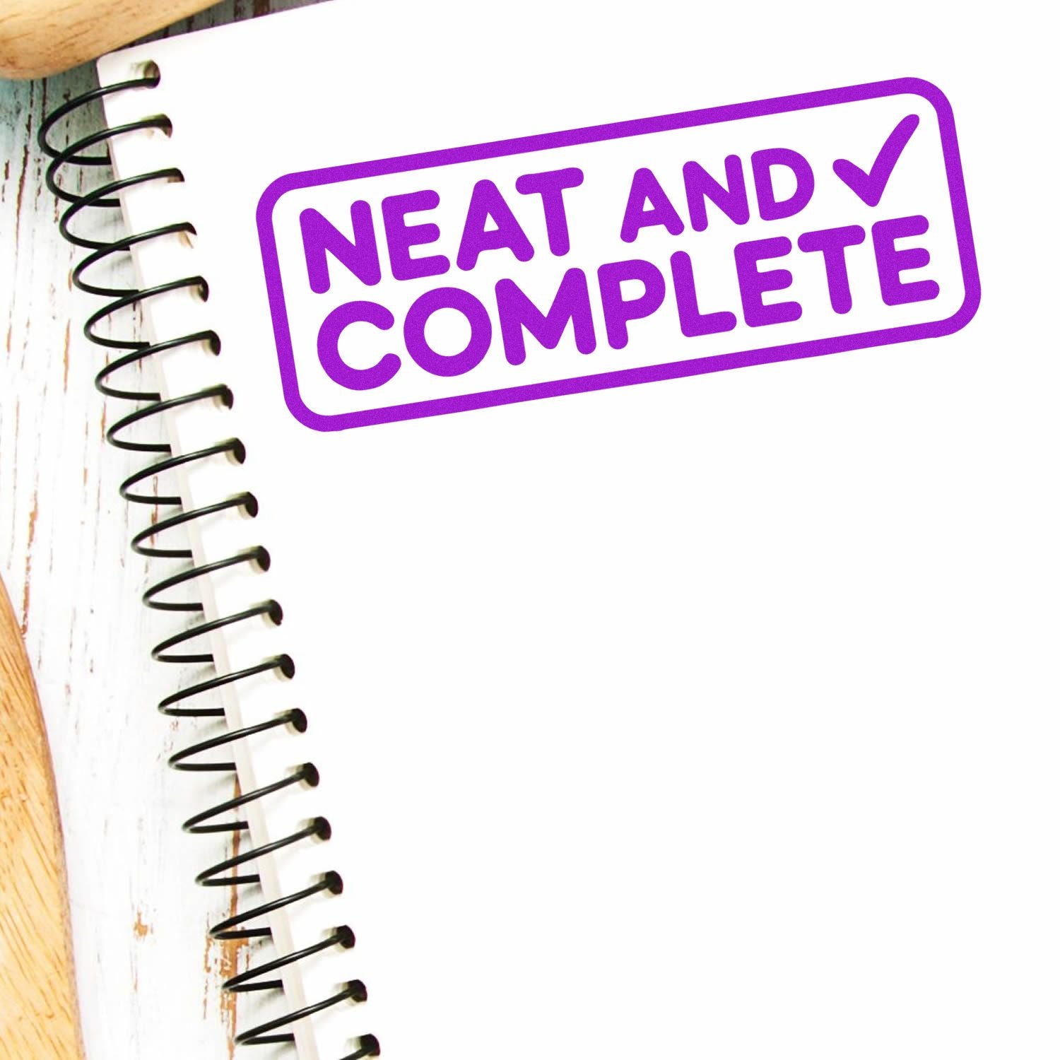 Neat and Complete rubber stamp design in purple, ideal for notebooks, planners, and office organization.