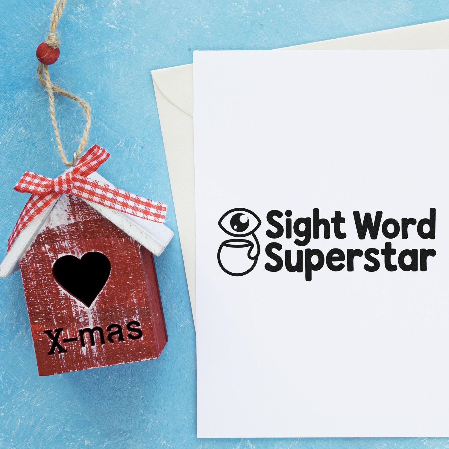 Sight Word Superstar rubber stamp shown with a handmade X-mas birdhouse ornament and heart cutout gift decor.