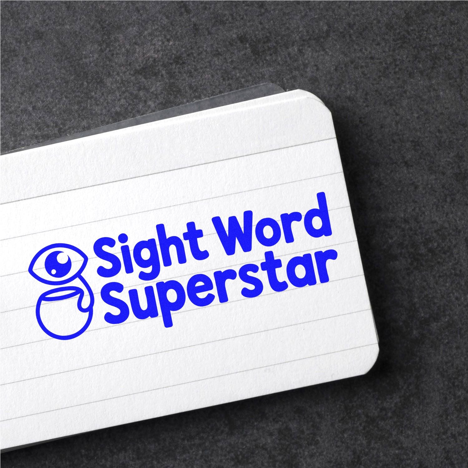 Sight Word Superstar rubber stamp design with eye icon, perfect for rewarding students in reading and literacy activities.