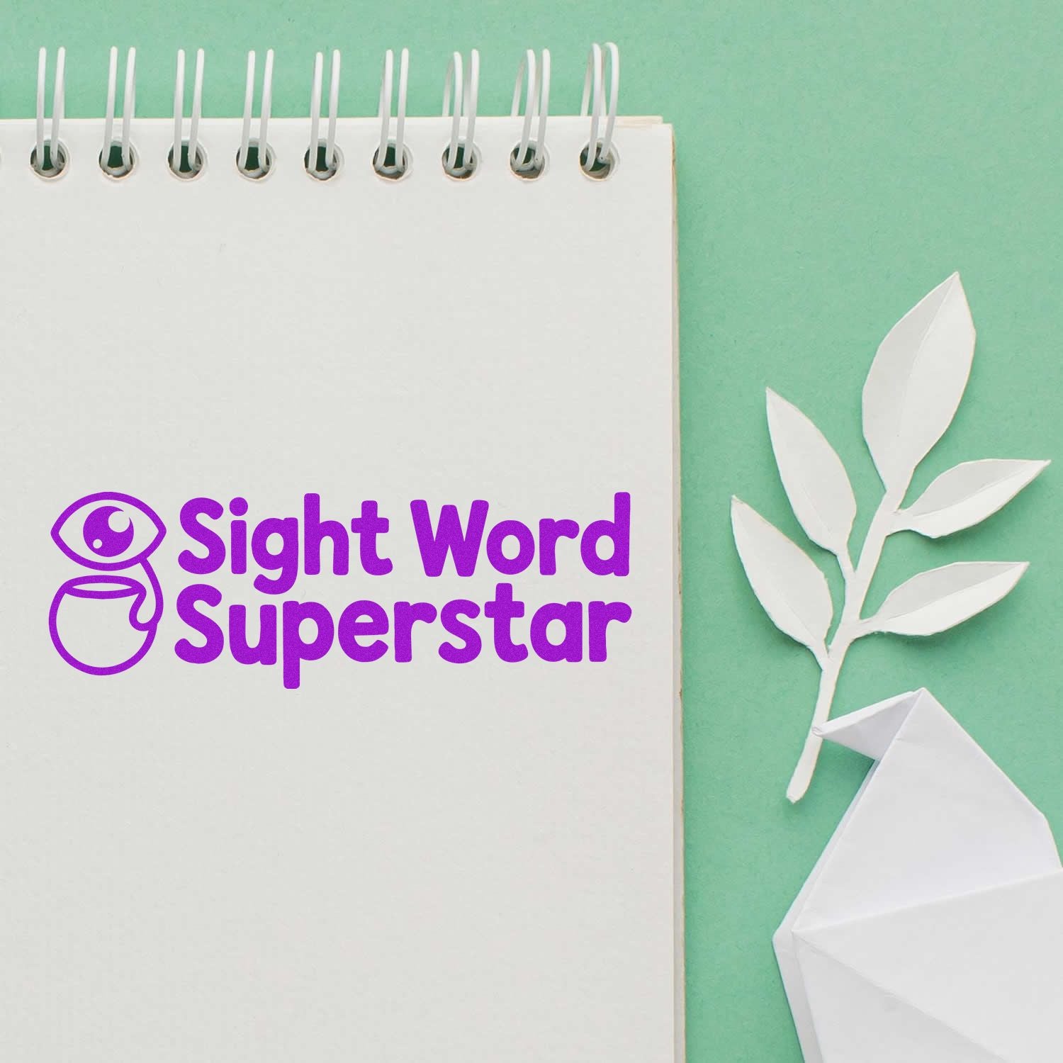Sight Word Superstar rubber stamp impression on a spiral notebook, perfect for classroom literacy rewards.