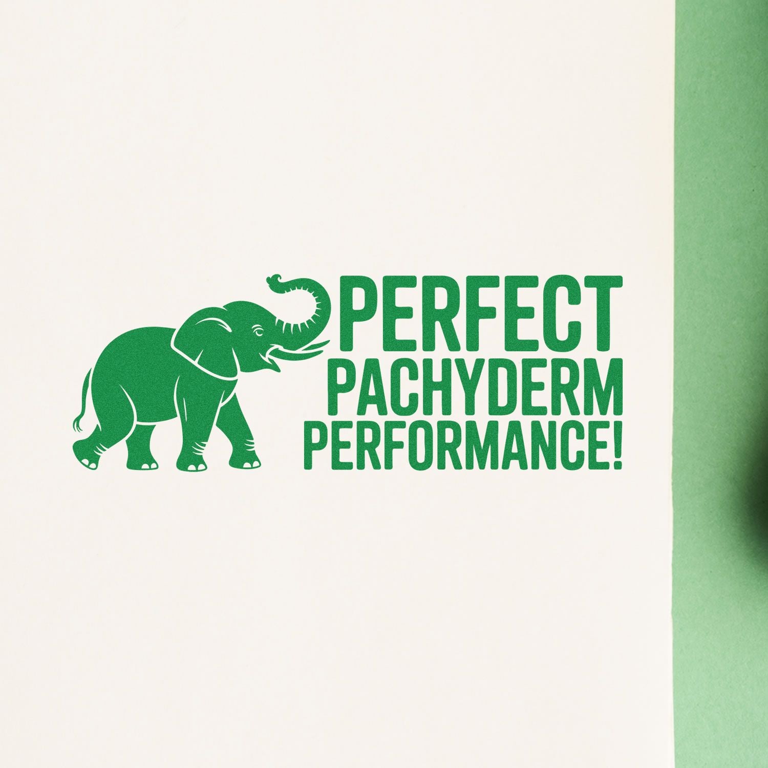 Green elephant rubber stamp impression reading Perfect Pachyderm Performance! on white paper