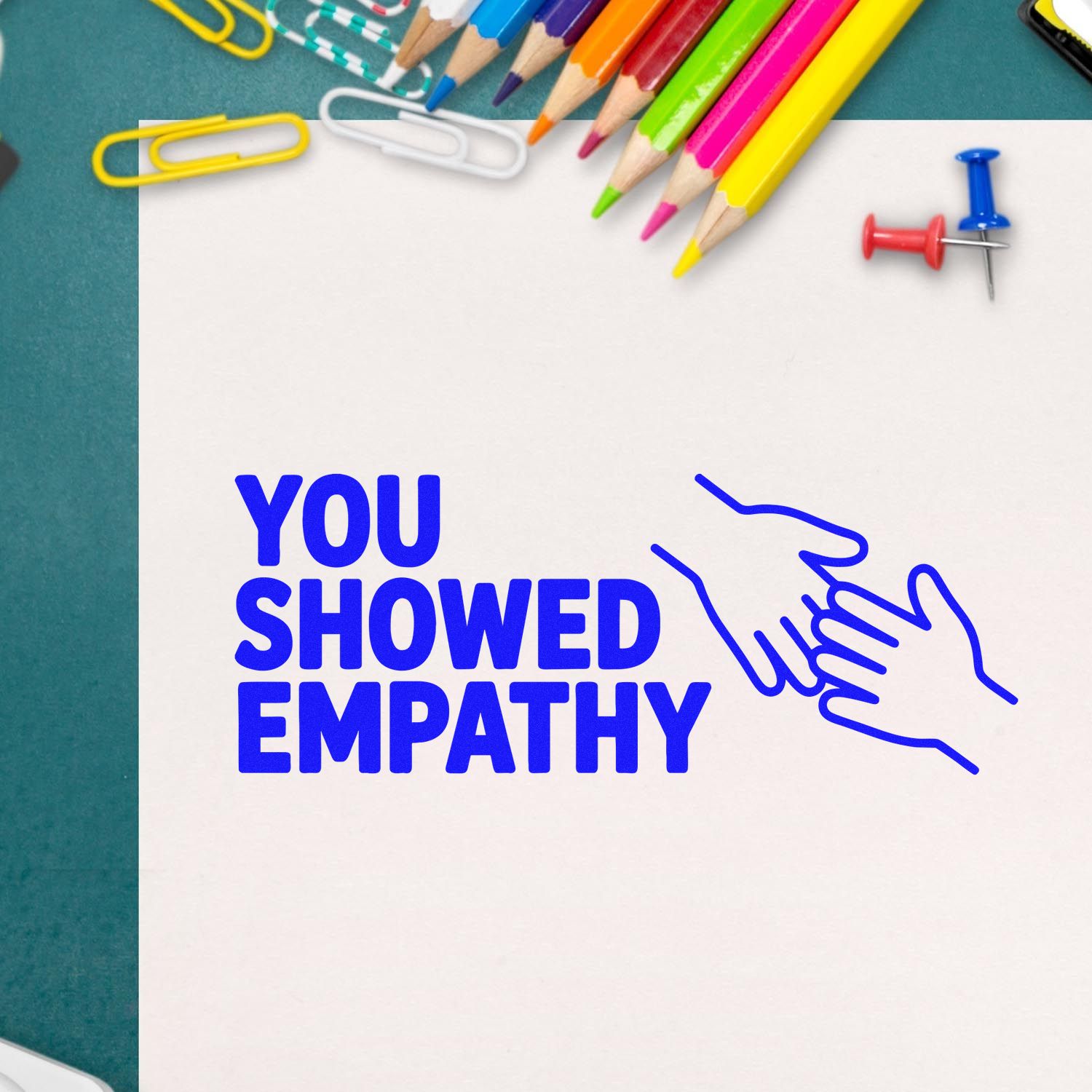 Empathy rubber stamp design with helping hands icon and bold You Showed Empathy text for classroom recognition.