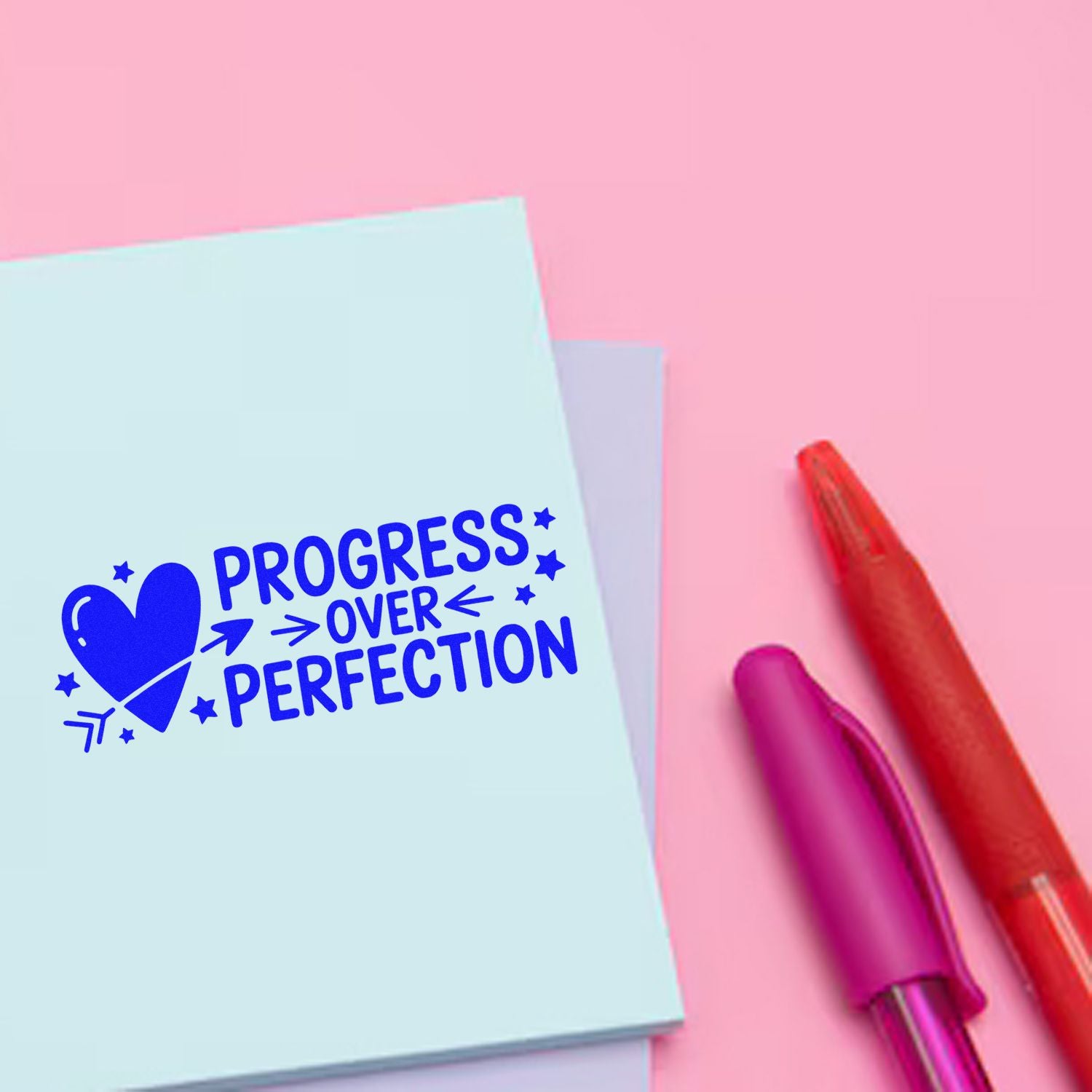Custom rubber stamp with Progress Over Perfection slogan and heart icon for planners, journals, and stationery.