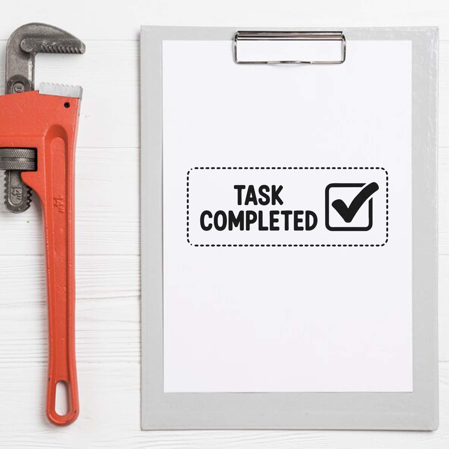 Task completed rubber stamp with checkmark on clipboard, ideal for office approval, workflow tracking, and project status marking.