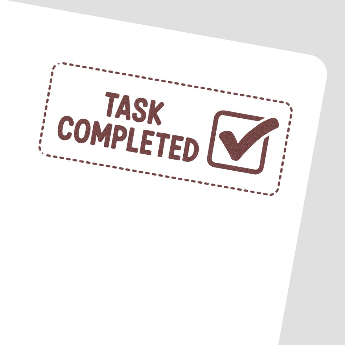 Task completed rubber stamp with checkmark icon, ideal for marking finished or approved paperwork.
