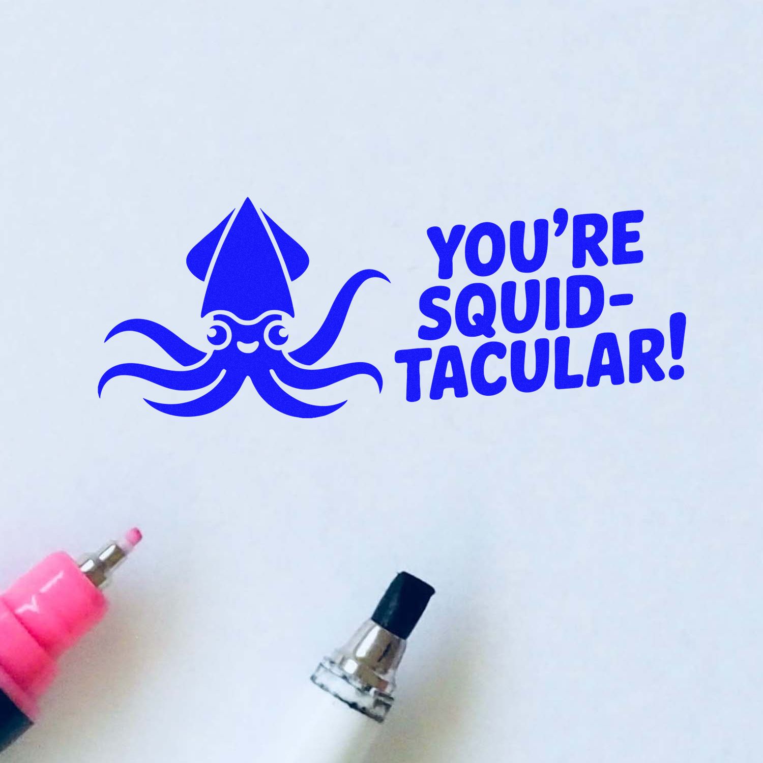 Blue Youre Squid-tacular! rubber stamp with squid design, ideal for ocean-themed crafts, note cards, and playful paper goods.
