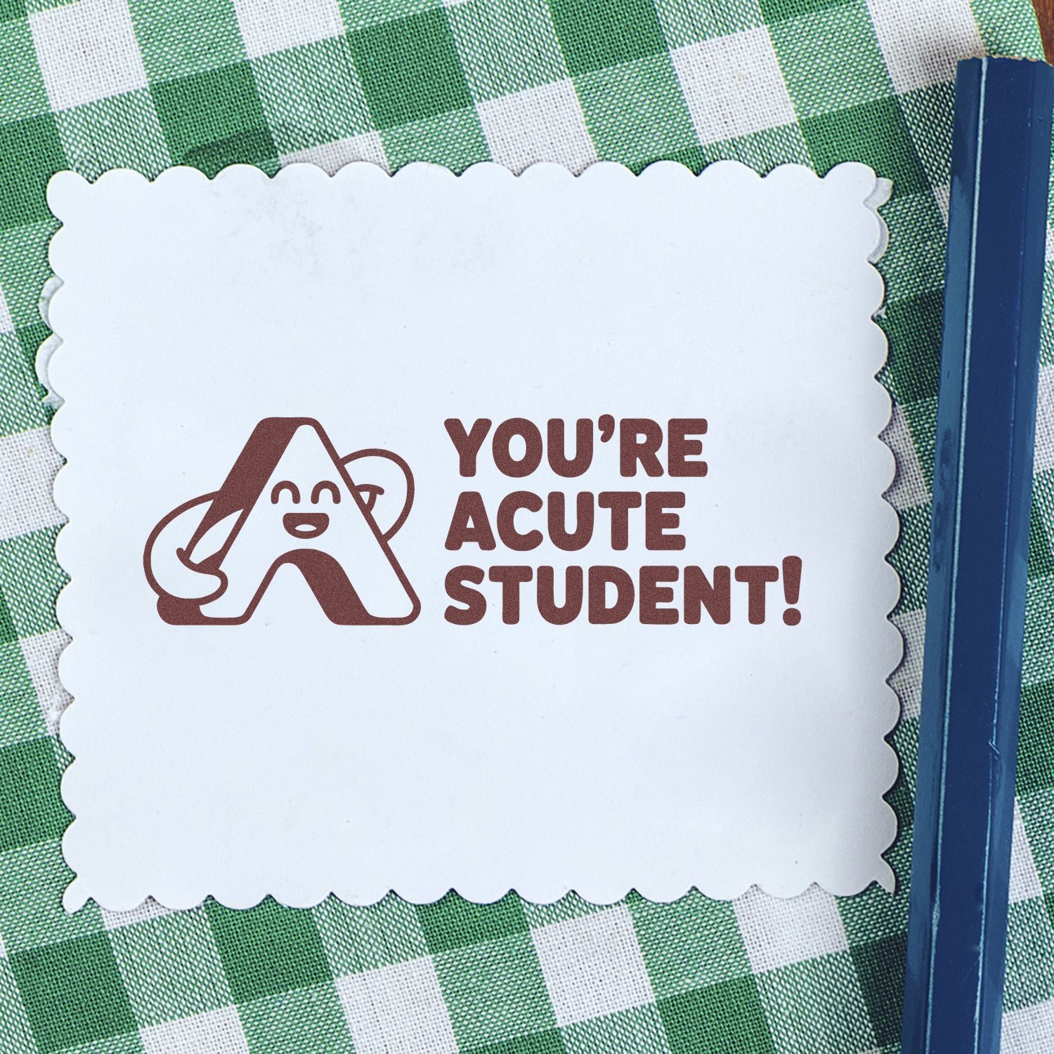 Rubber stamp impression reading Youre acute student! with smiling letter A, ideal for teacher math reward cards.