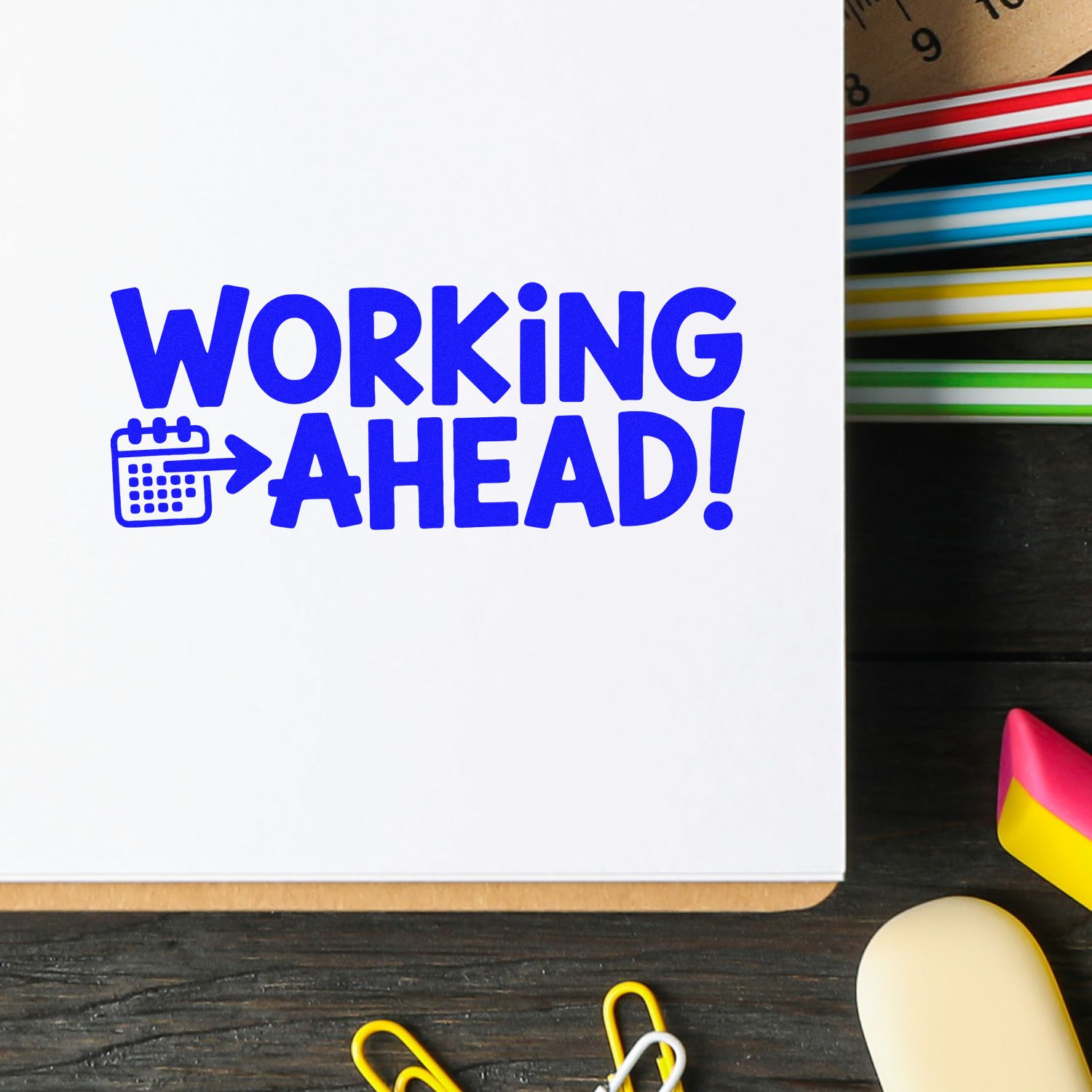 Blue Working Ahead custom rubber stamp design with calendar icon for office planning and scheduling.