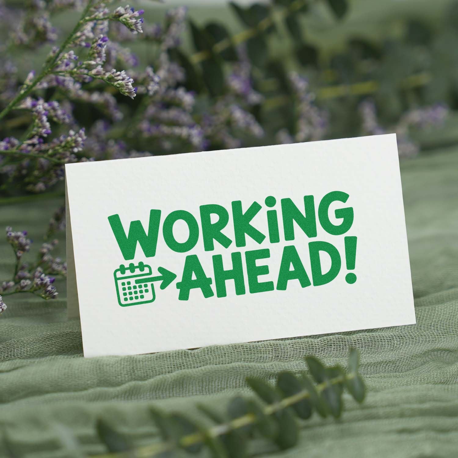 Working Ahead! rubber stamp design with calendar icon on a white card, perfect for planner and office use.