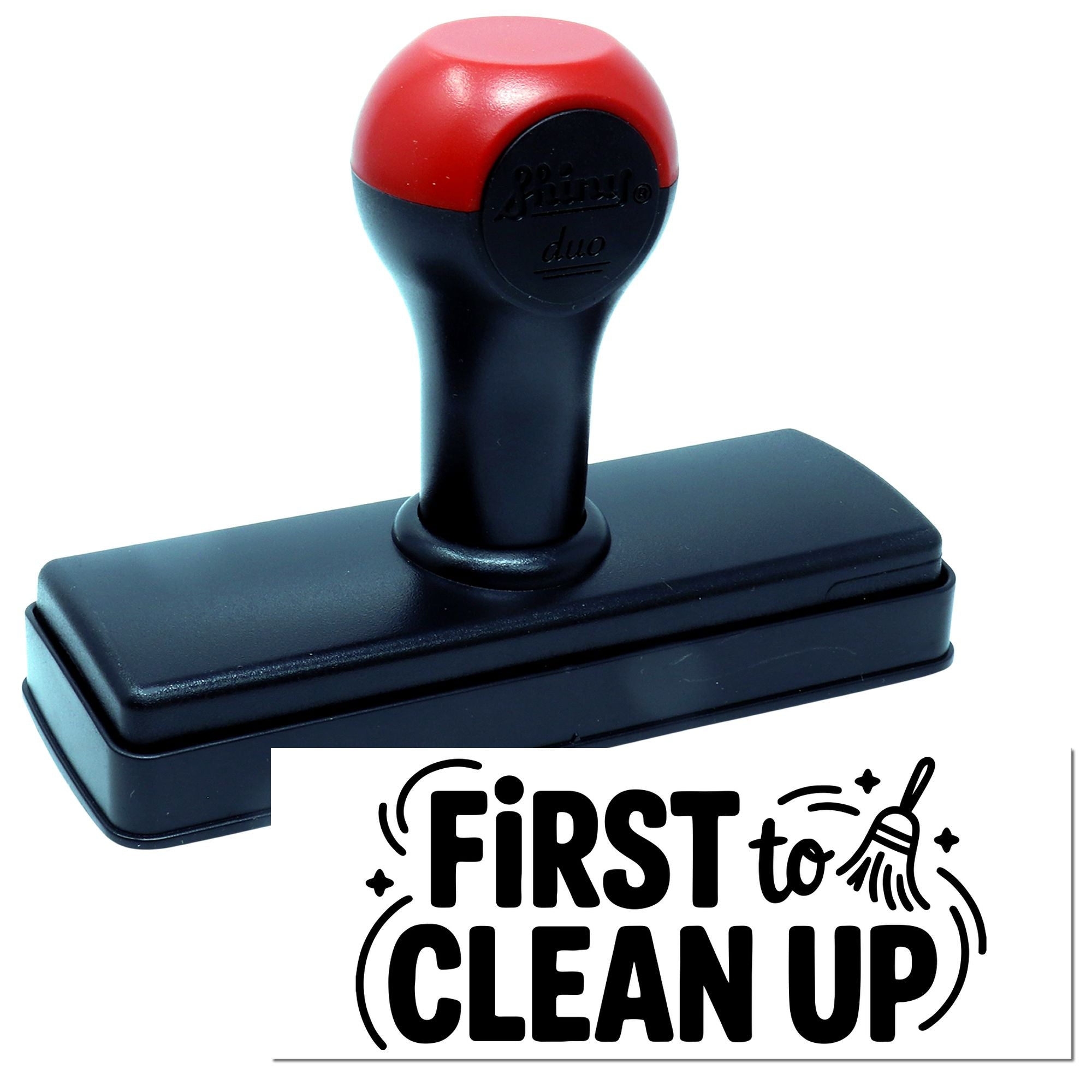 Self-inking rubber stamp with First to Clean Up imprint for classroom reward and behavior tracking.