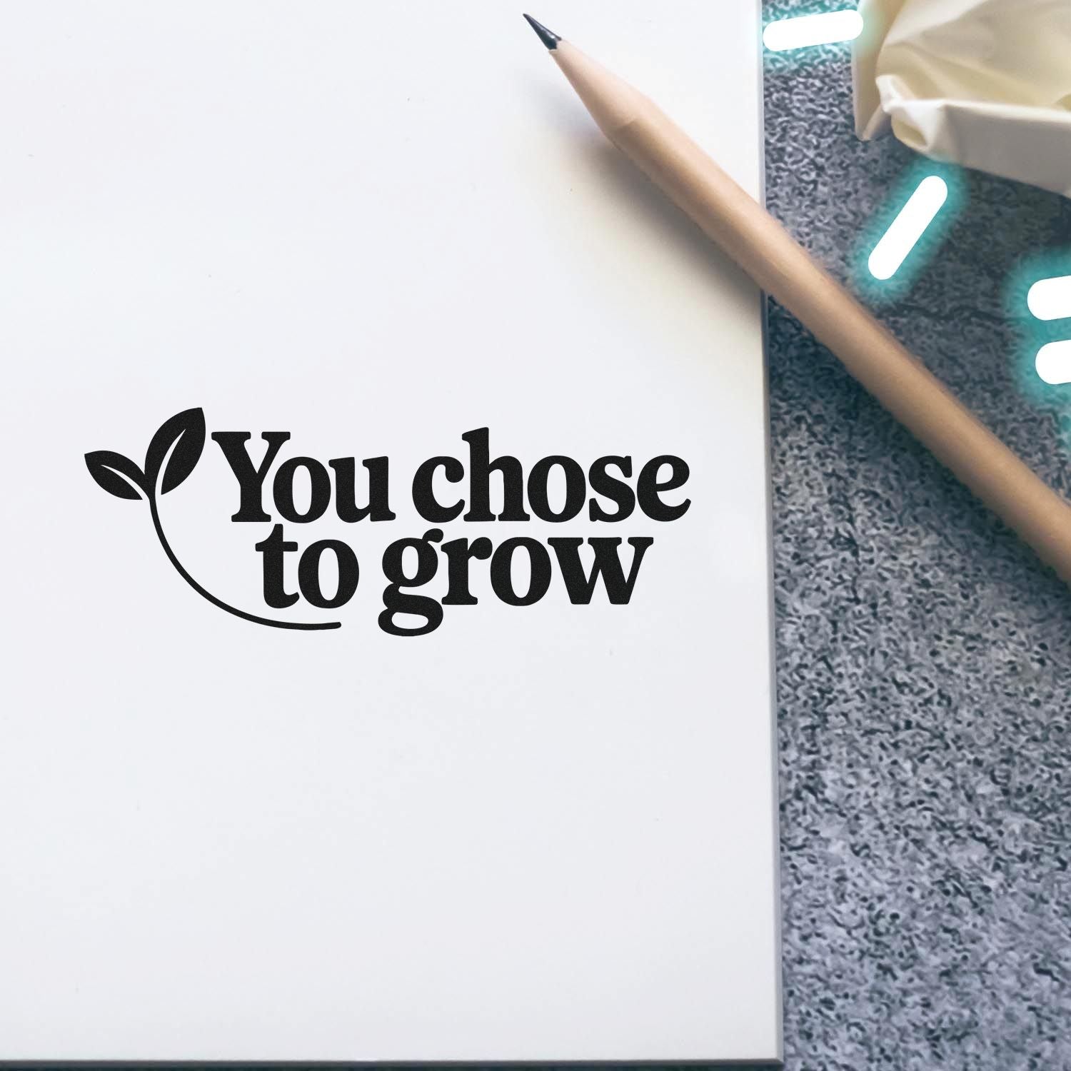 You chose to grow plant-themed rubber stamp on notebook paper with pencil, ideal for eco-inspired branding and journaling.