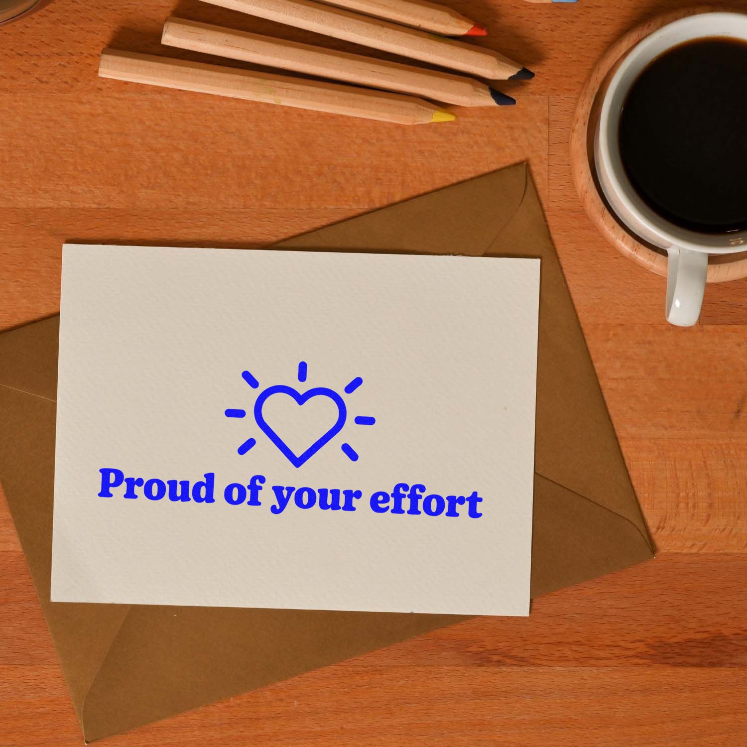 Proud of your effort rubber stamp design with heart icon on greeting card, perfect for teacher encouragement notes.