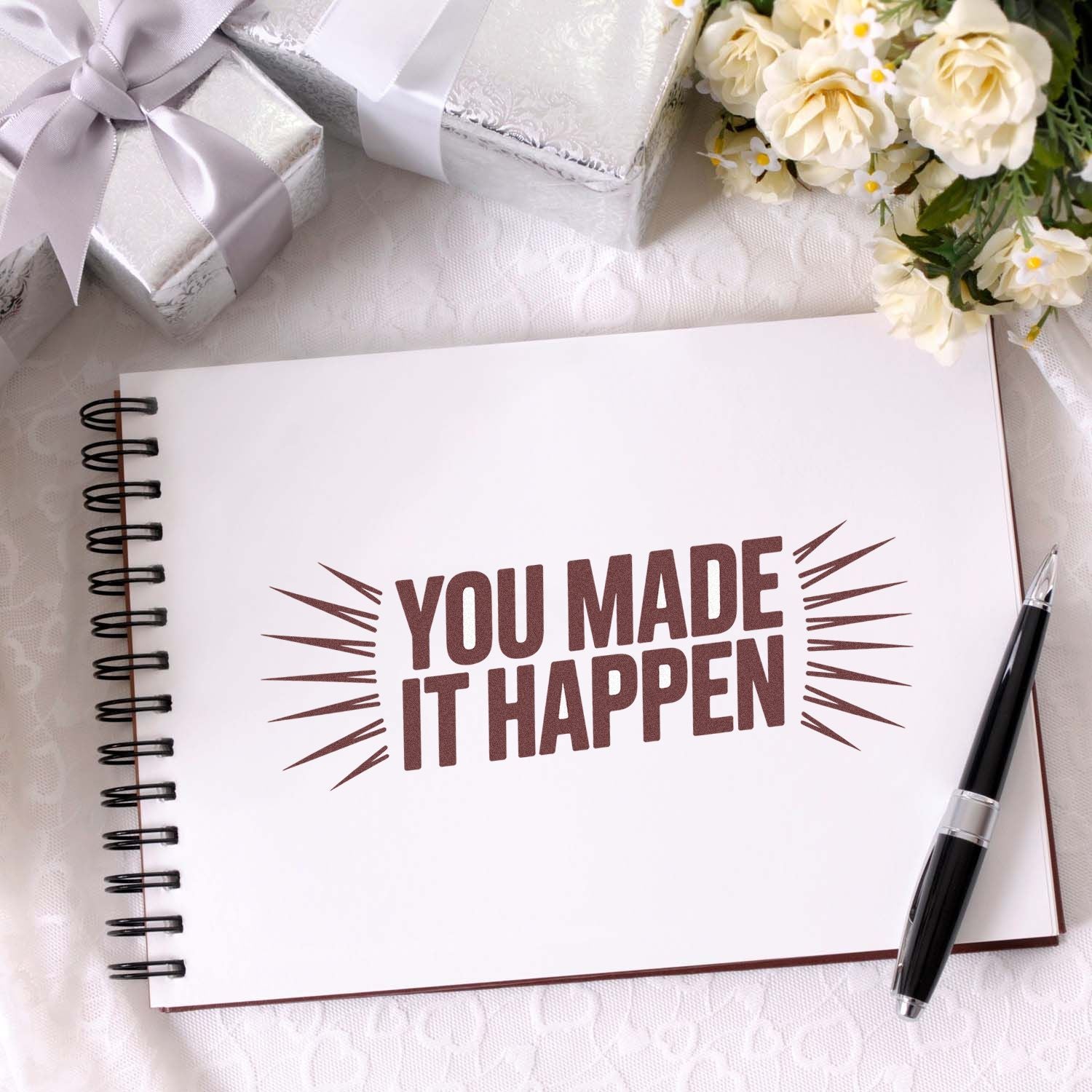 You Made It Happen rubber stamp on notebook with gift boxes and flowers for handmade thank-you packaging and celebration crafts.