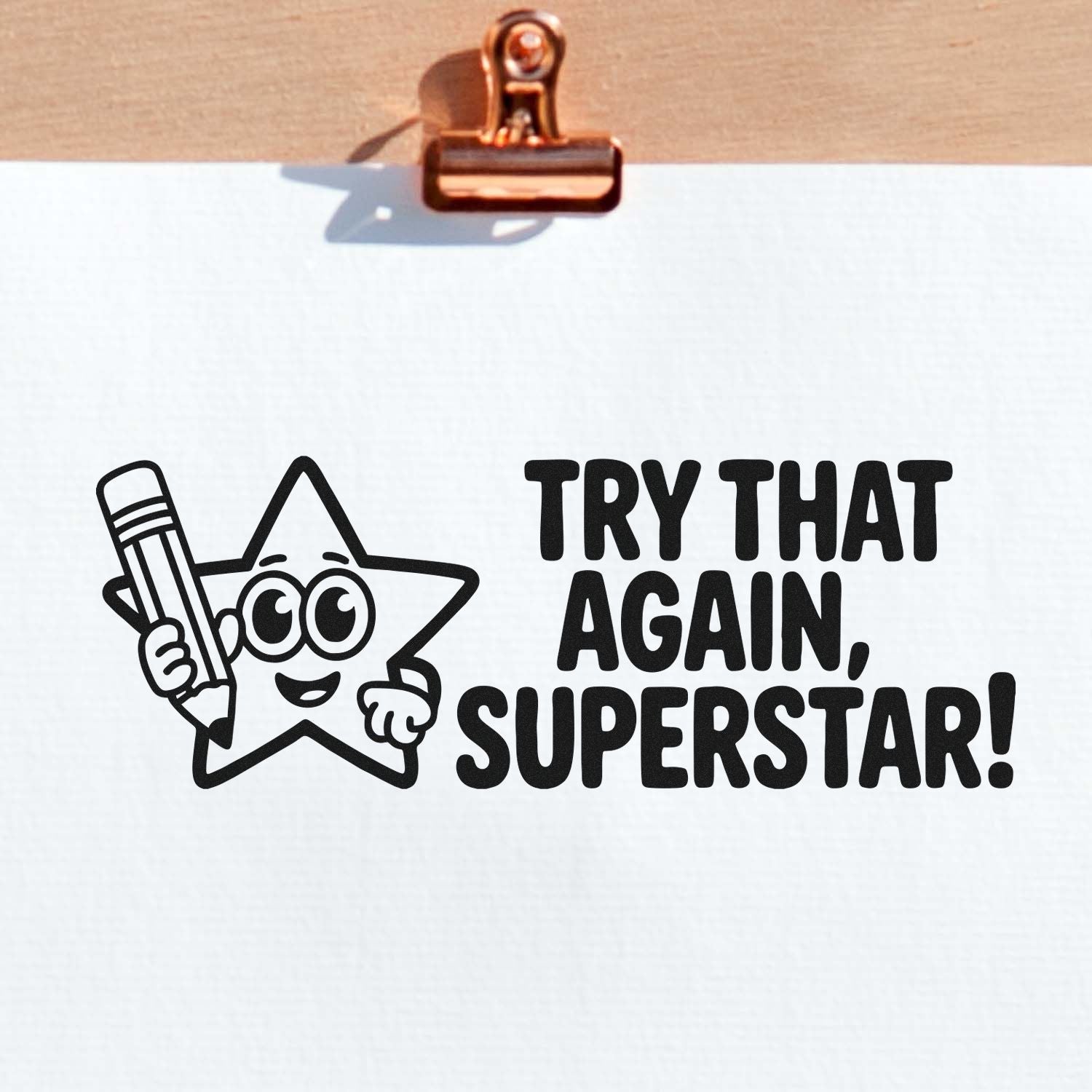 Cute motivational rubber stamp design with star mascot and pencil reading Try That Again, Superstar!