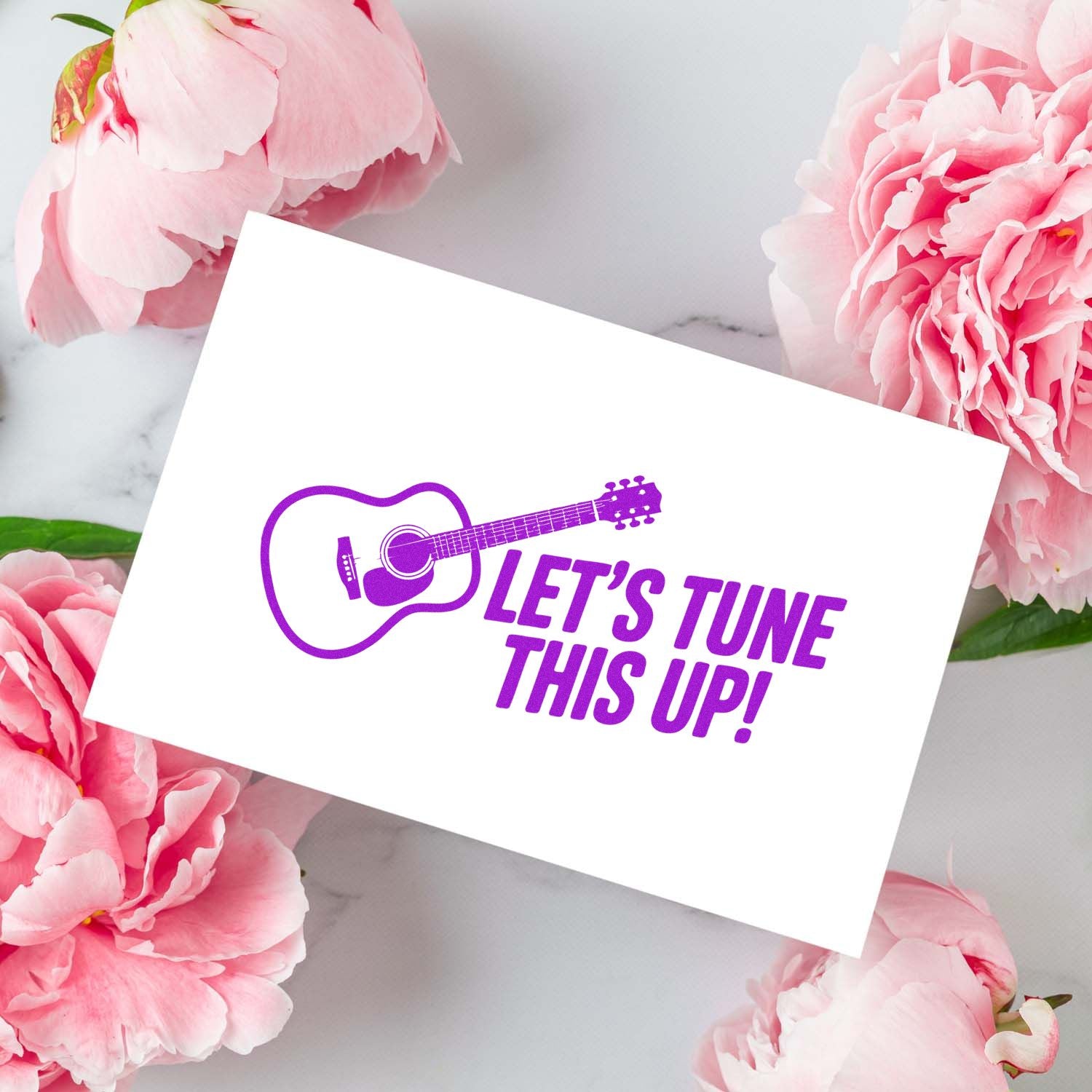 Music-themed rubber stamp design with guitar and Lets Tune This Up! slogan for cards, crafts, and musician projects.