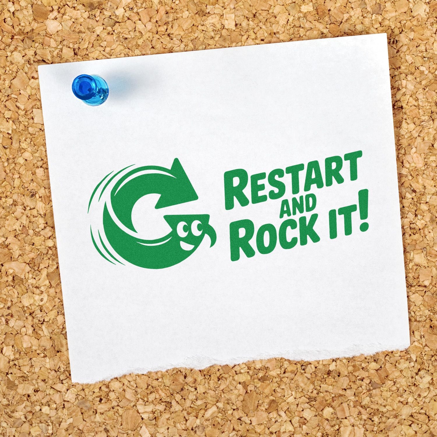 Green rubber stamp design reading Restart and Rock It! pinned to corkboard, ideal for custom motivational rubber stamps.