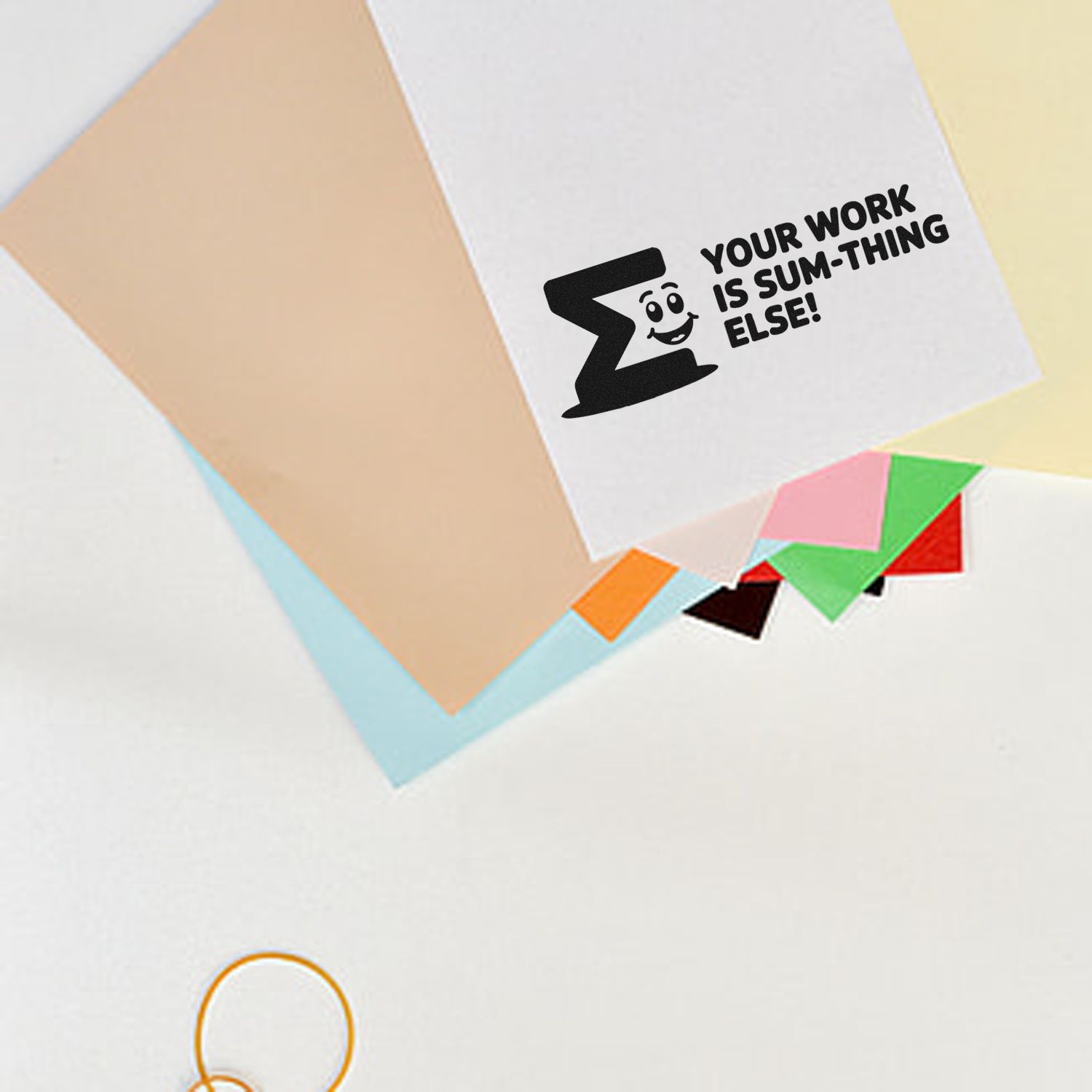 Rubber stamp reading Your work is sum-thing else! on paper, a fun teacher stamp for grading and classroom encouragement.
