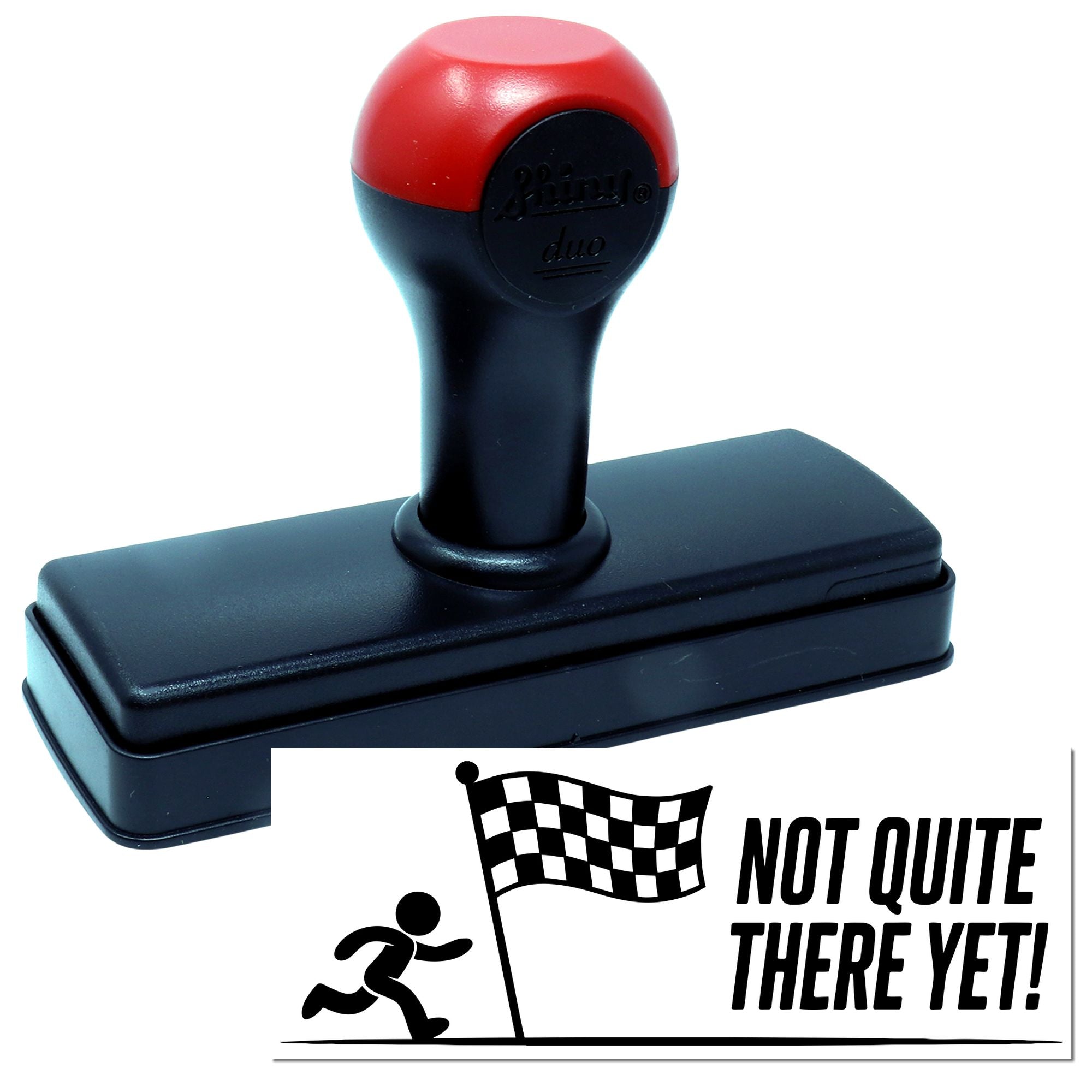 Custom self-inking rubber stamp with Not Quite There Yet! racing flag design for office, teacher, or motivational use.