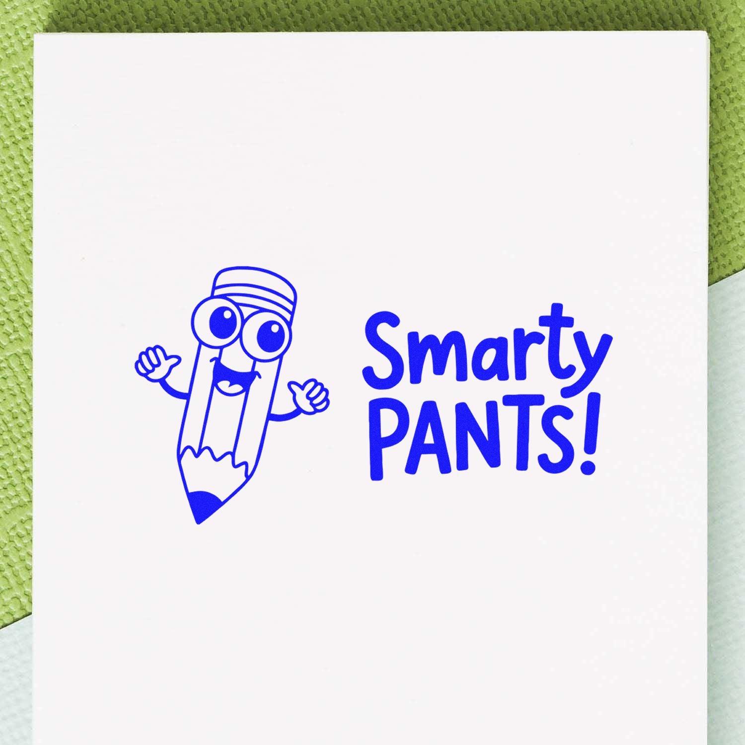Blue Smarty Pants pencil rubber stamp impression on white paper, playful school reward stamp.