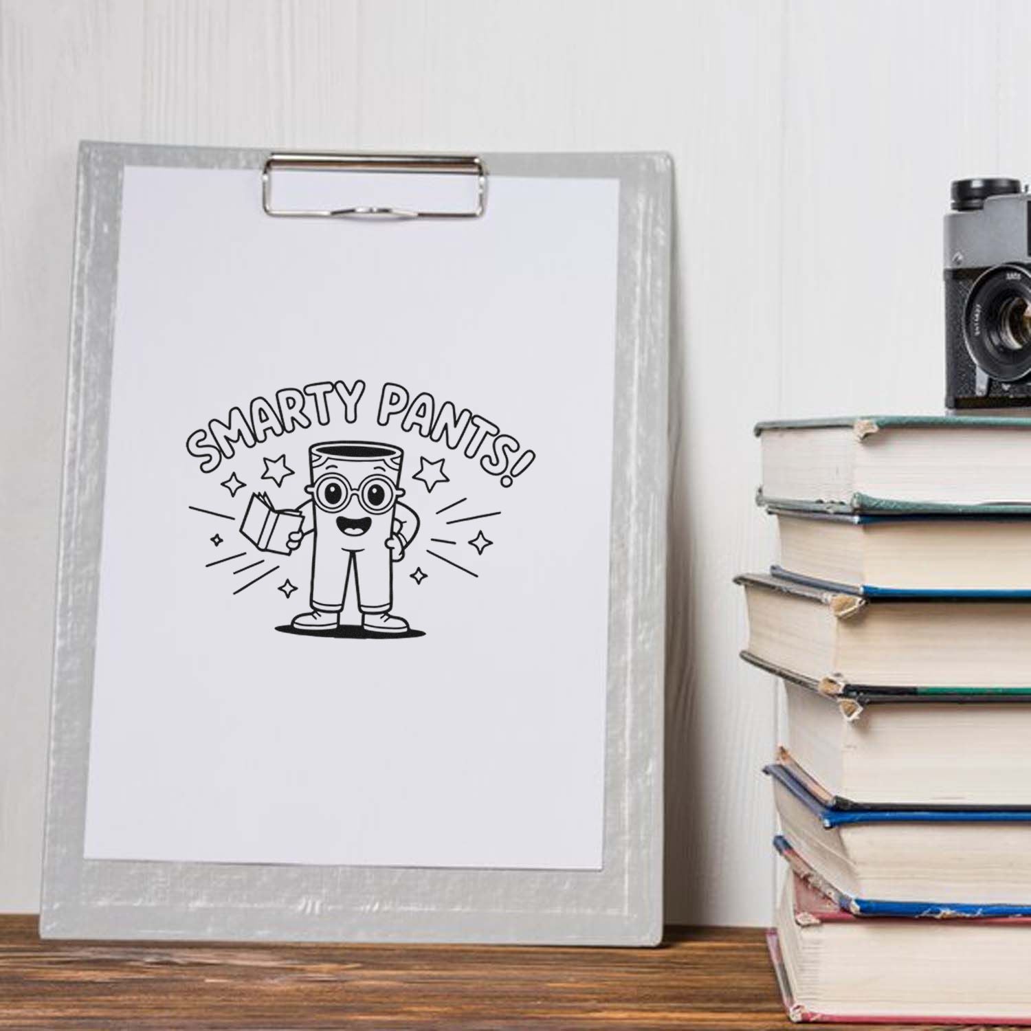 Smarty Pants rubber stamp design on clipboard, featuring a cute bookish character for teacher rewards, classroom or stationery use.