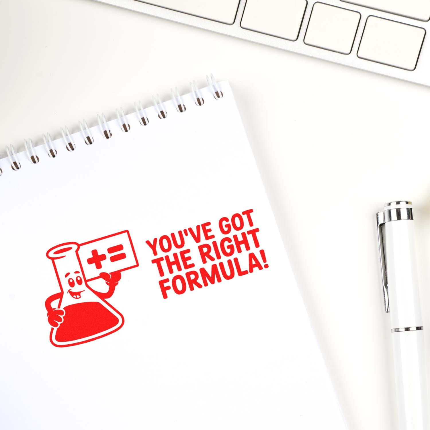 Custom rubber stamp impression with chemistry flask and Youve got the right formula! on notebook, ideal for teacher or lab use