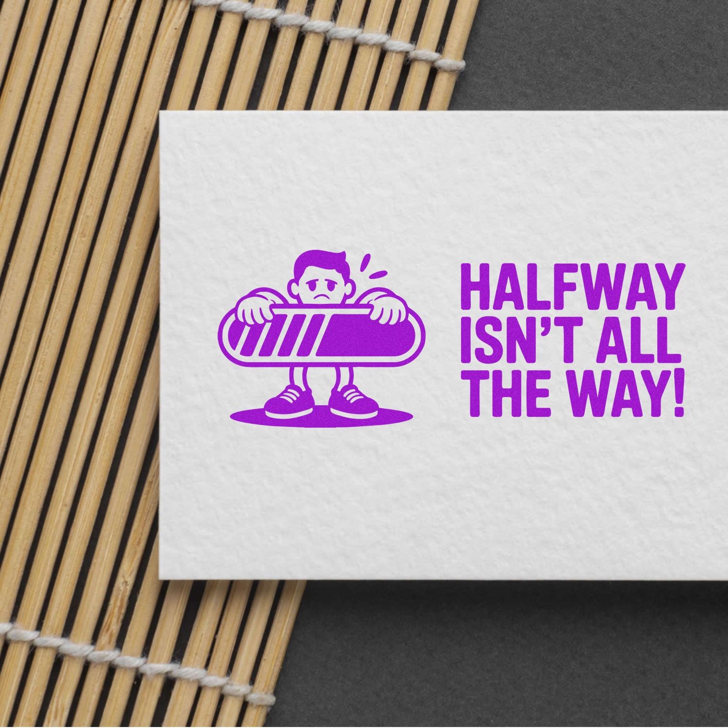 Purple motivational rubber stamp design reading Halfway Isnt All the Way! with cartoon figure holding a bar.
