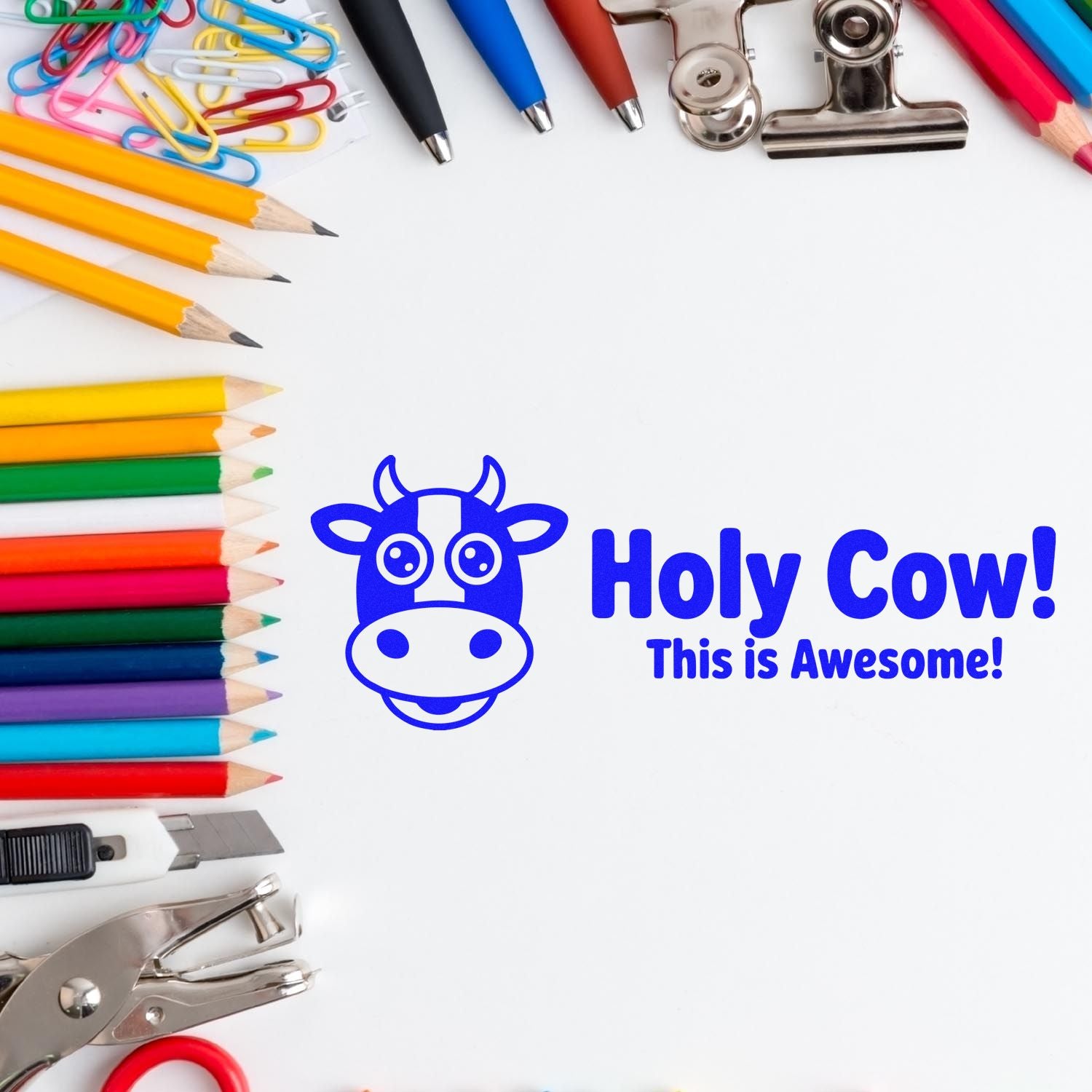 School supplies frame a blue Holy Cow! This is Awesome! rubber stamp design for classroom rewards and teacher supplies.