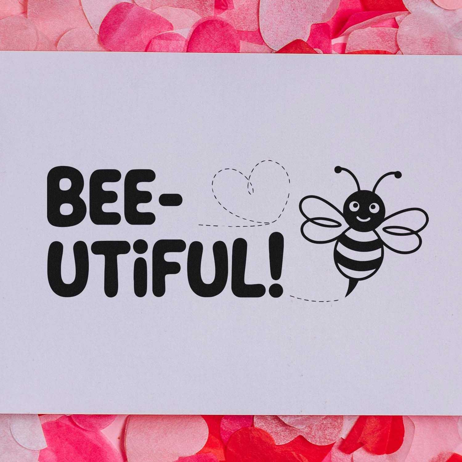 Bee-utiful bee rubber stamp design with cute bee and heart, ideal for handmade cards, scrapbooking, and packaging.